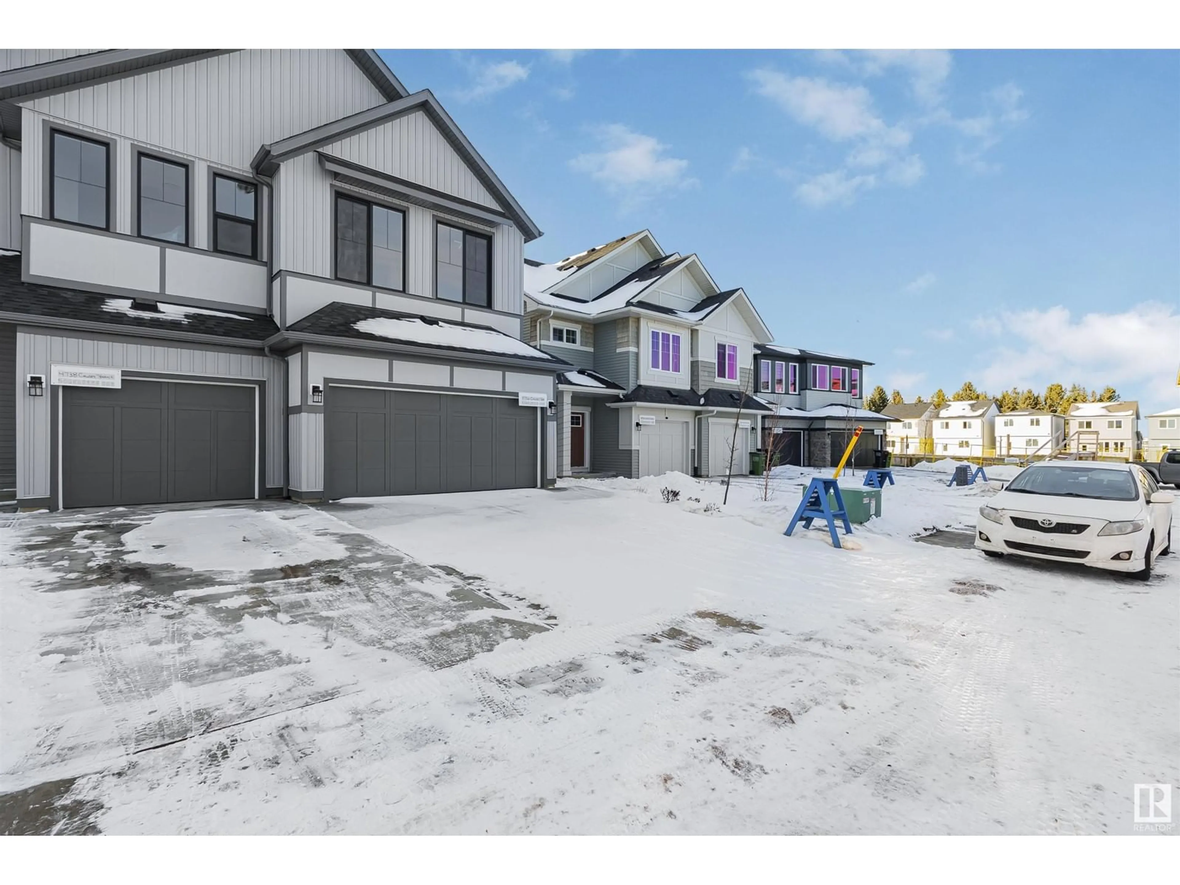 A pic from exterior of the house or condo, the street view for 4736 CAWSEY TC SW, Edmonton Alberta T6W4M5