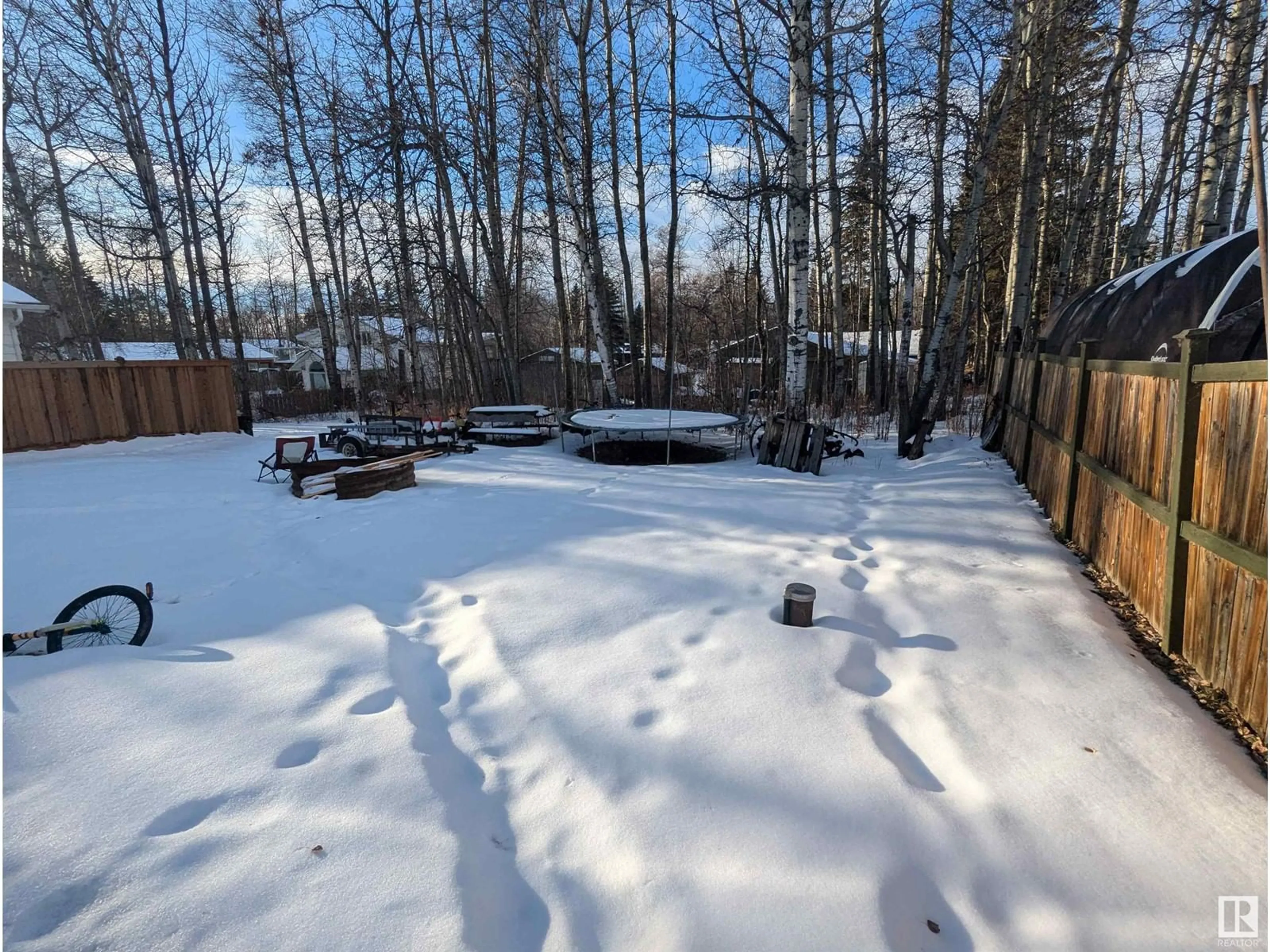 A pic from outside/outdoor area/front of a property/back of a property/a pic from drone, forest/trees view for 525 5 ST, Rural Lac Ste. Anne County Alberta T0E1A6