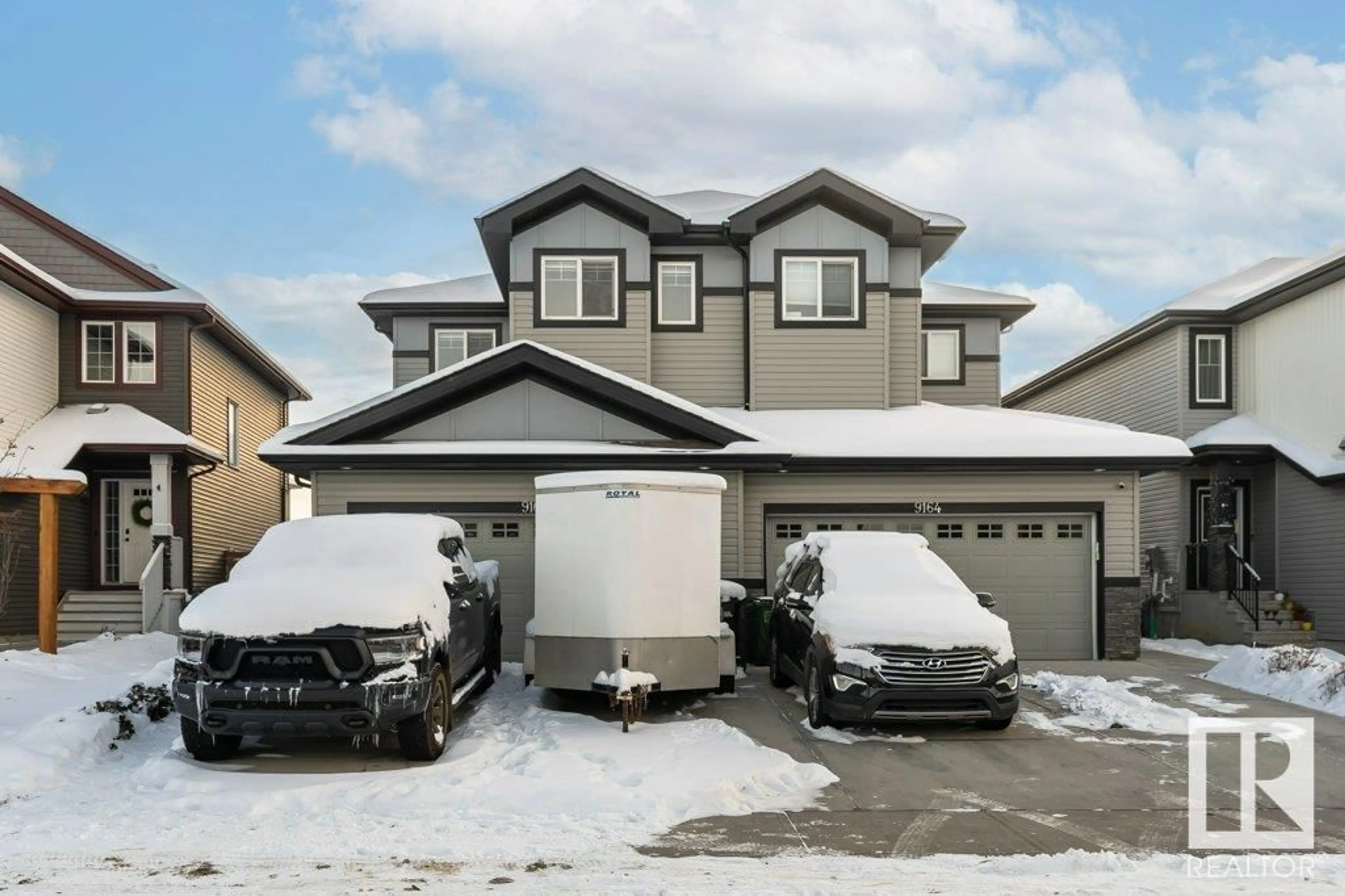 Frontside or backside of a home, the street view for 9162 Cooper Crescent SW, Edmonton Alberta T6W3K9