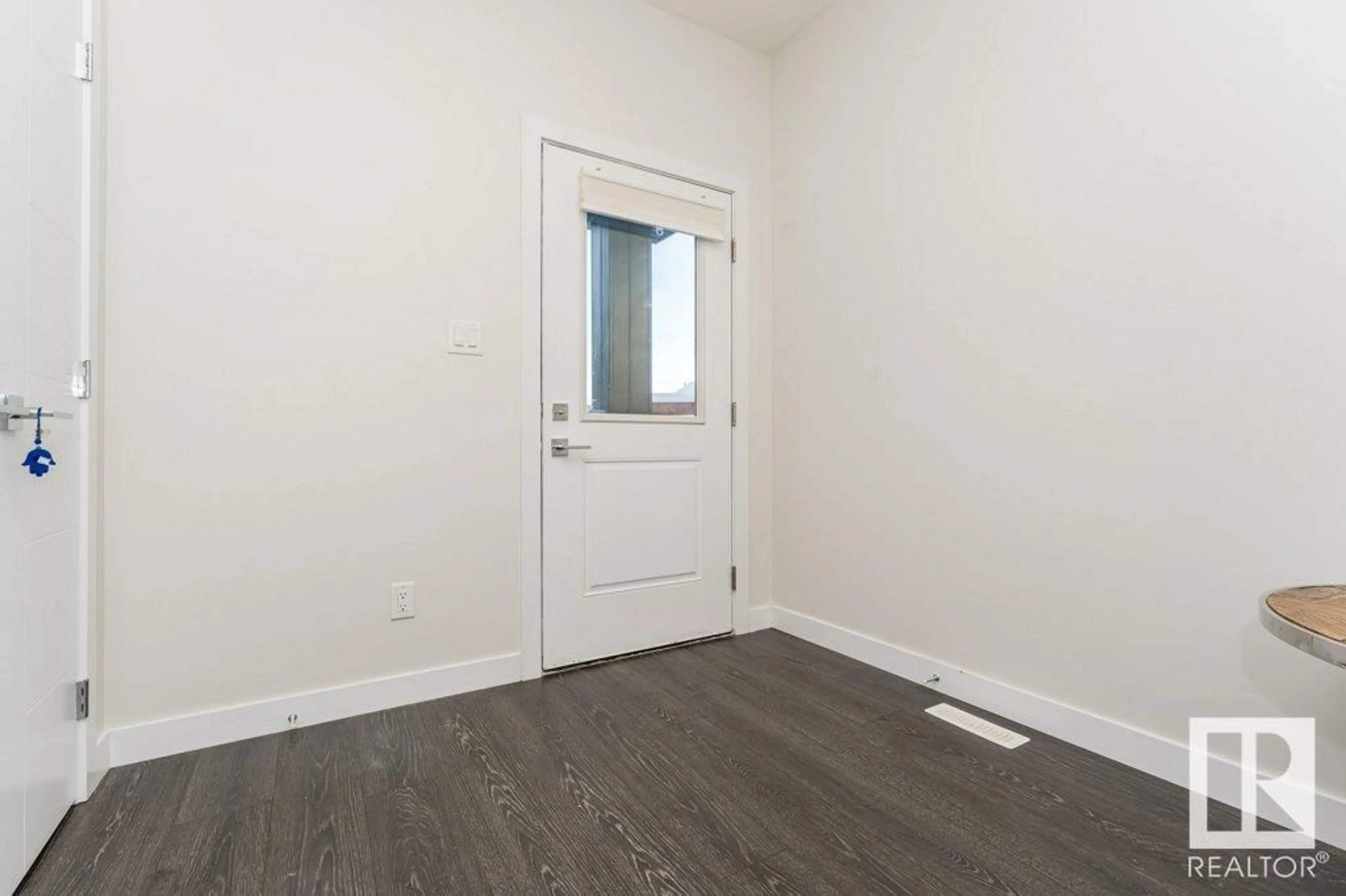 Indoor entryway, wood floors for 9162 Cooper Crescent SW, Edmonton Alberta T6W3K9