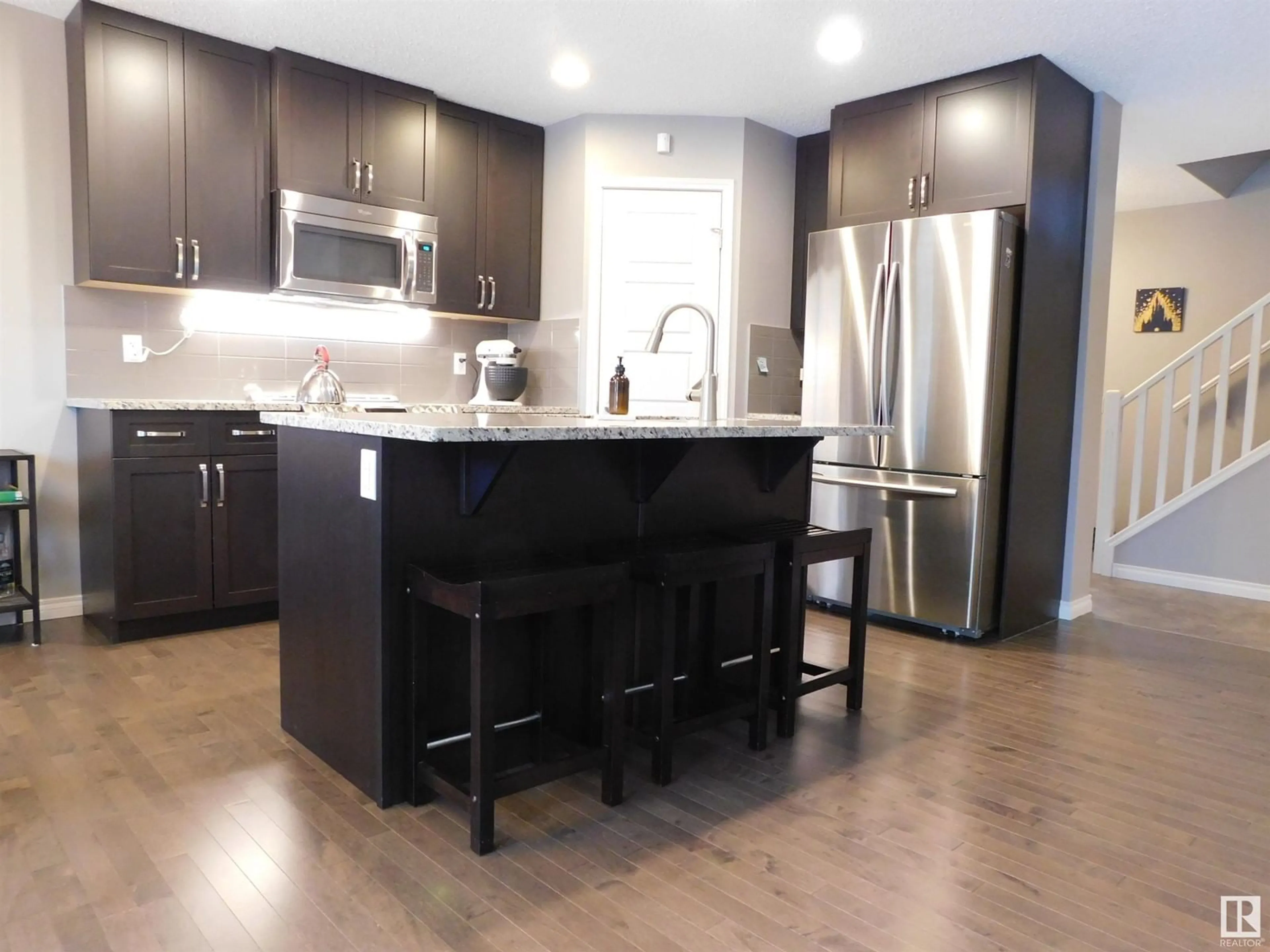 Open concept kitchen for 16448 140 ST NW, Edmonton Alberta T6V0K7