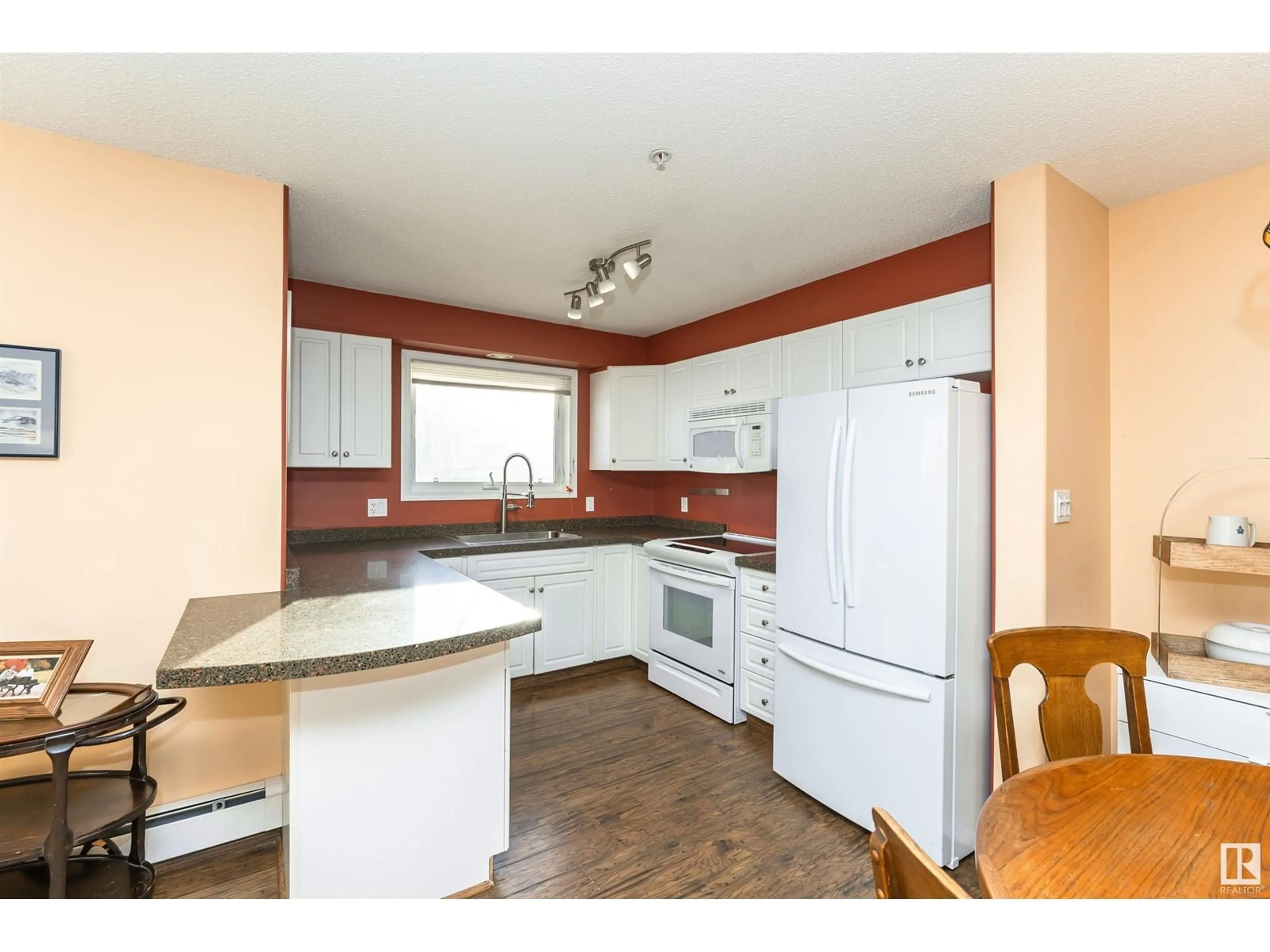 Standard kitchen, wood floors, cottage for #114 13625 34 ST NW, Edmonton Alberta T5A0E3