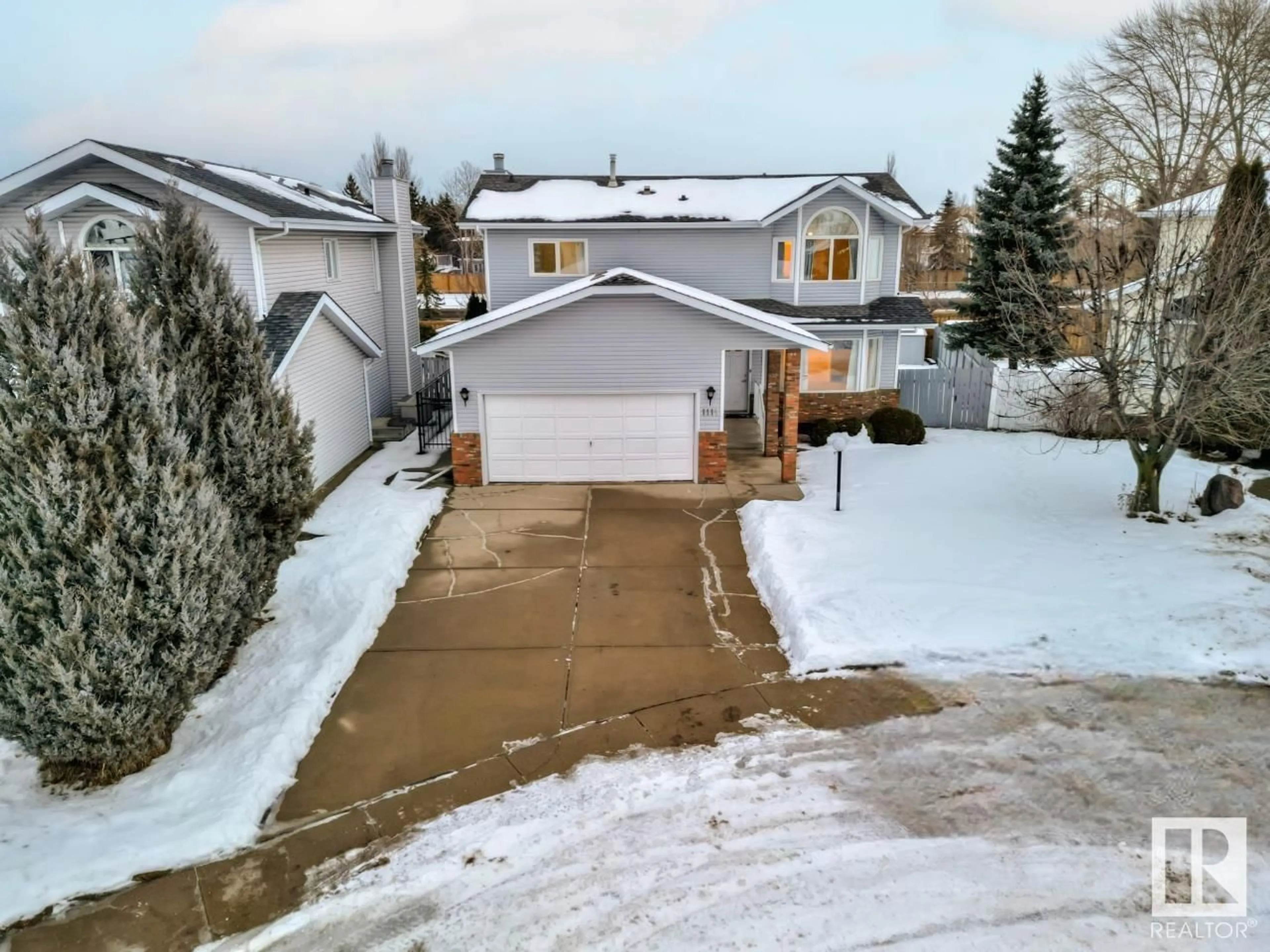 Frontside or backside of a home, the street view for 1111 111A ST NW, Edmonton Alberta T6J6R9