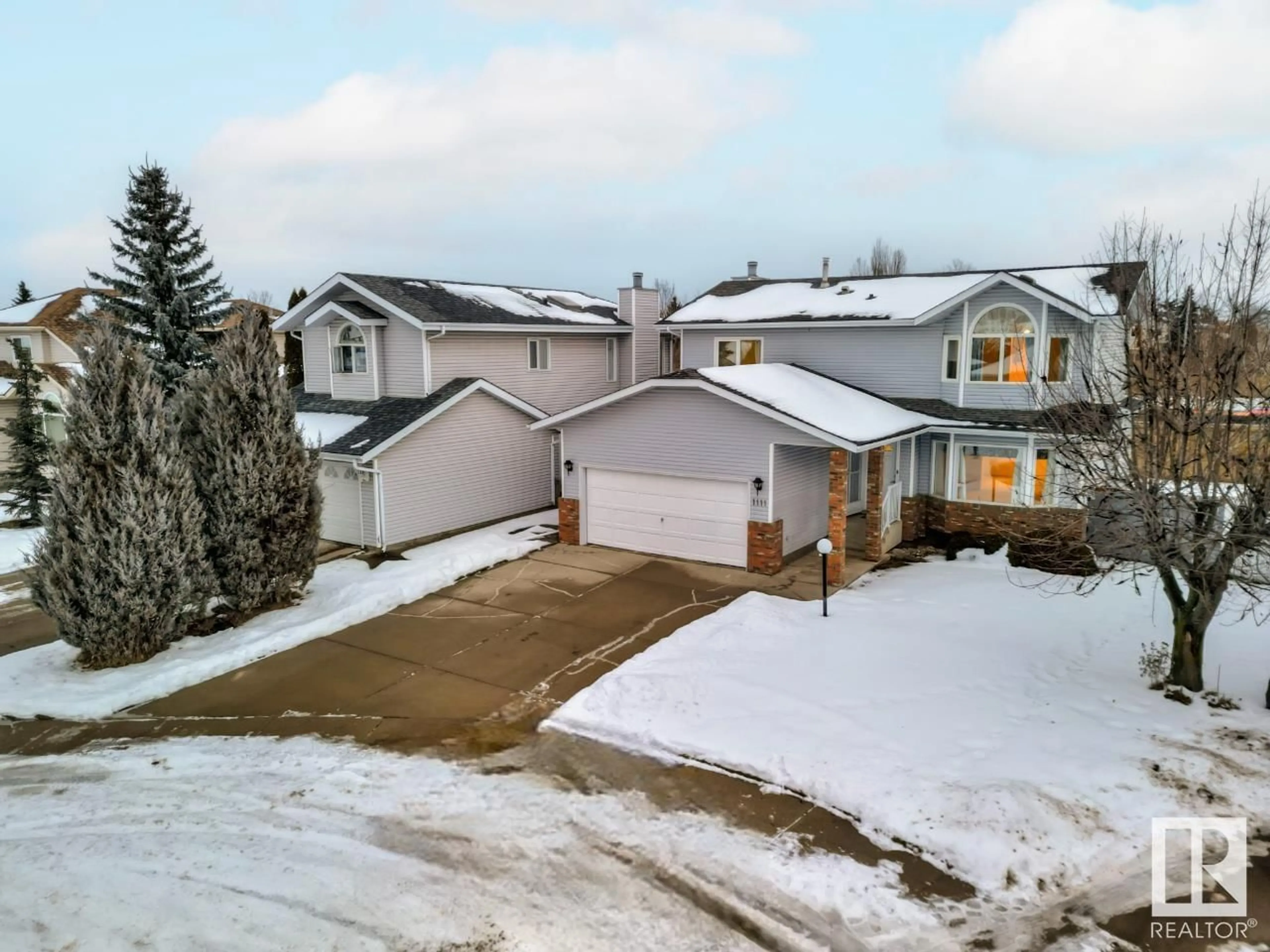 Frontside or backside of a home, the street view for 1111 111A ST NW, Edmonton Alberta T6J6R9