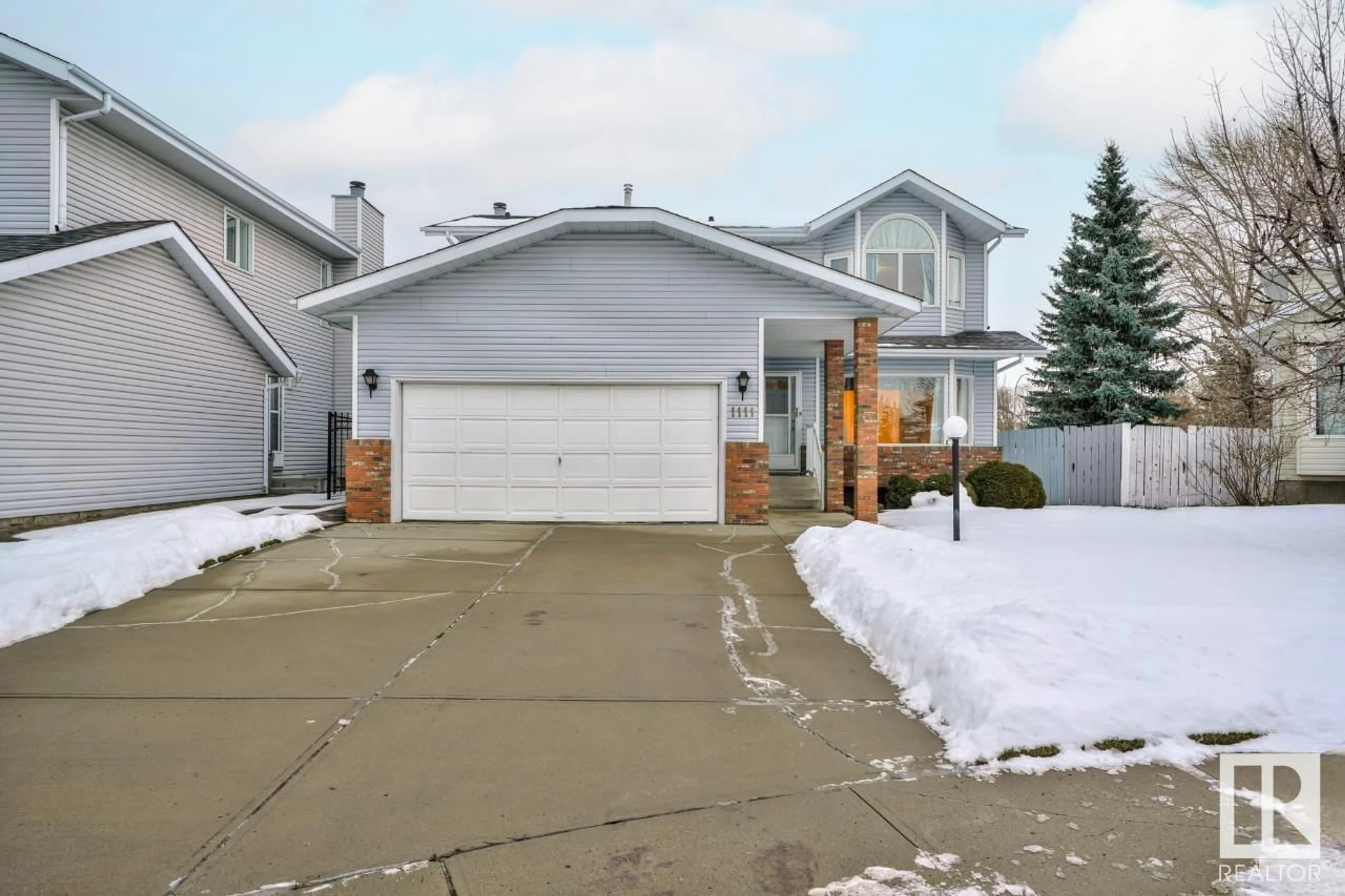 Frontside or backside of a home, the street view for 1111 111A ST NW, Edmonton Alberta T6J6R9