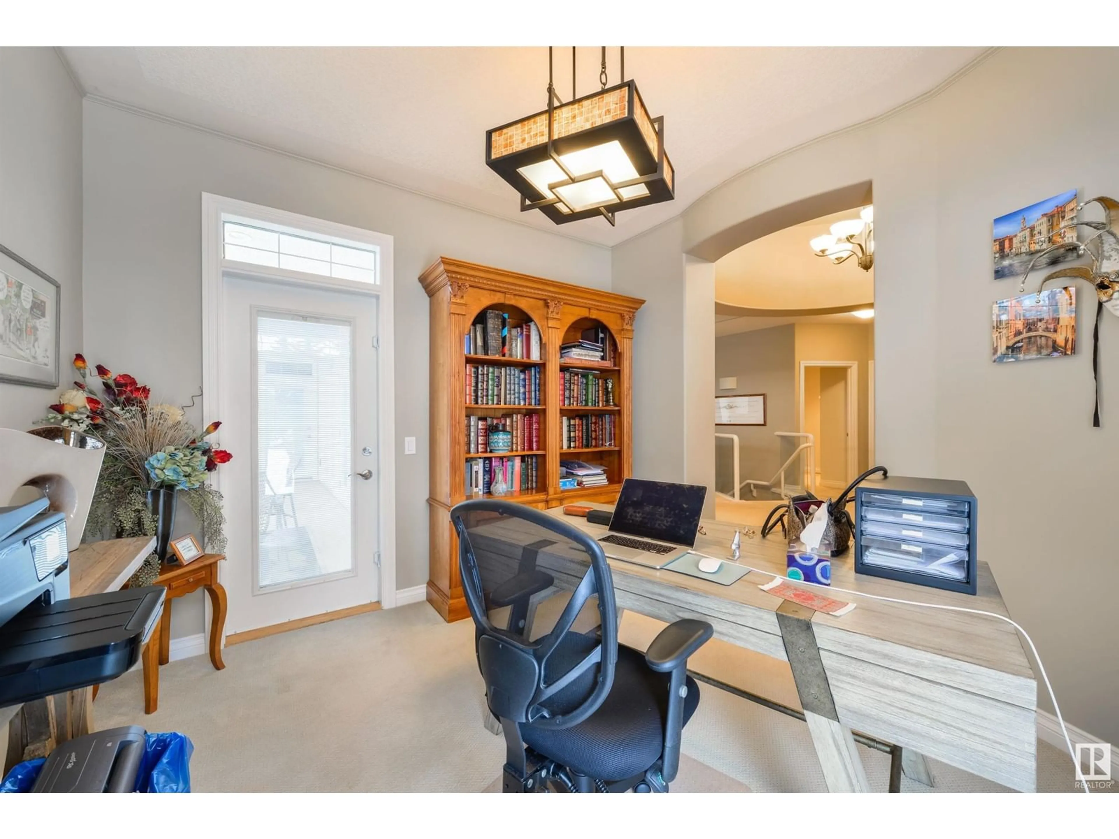 A pic of a room, wood floors for #57 1225 WANYANDI RD NW, Edmonton Alberta T6M2W7