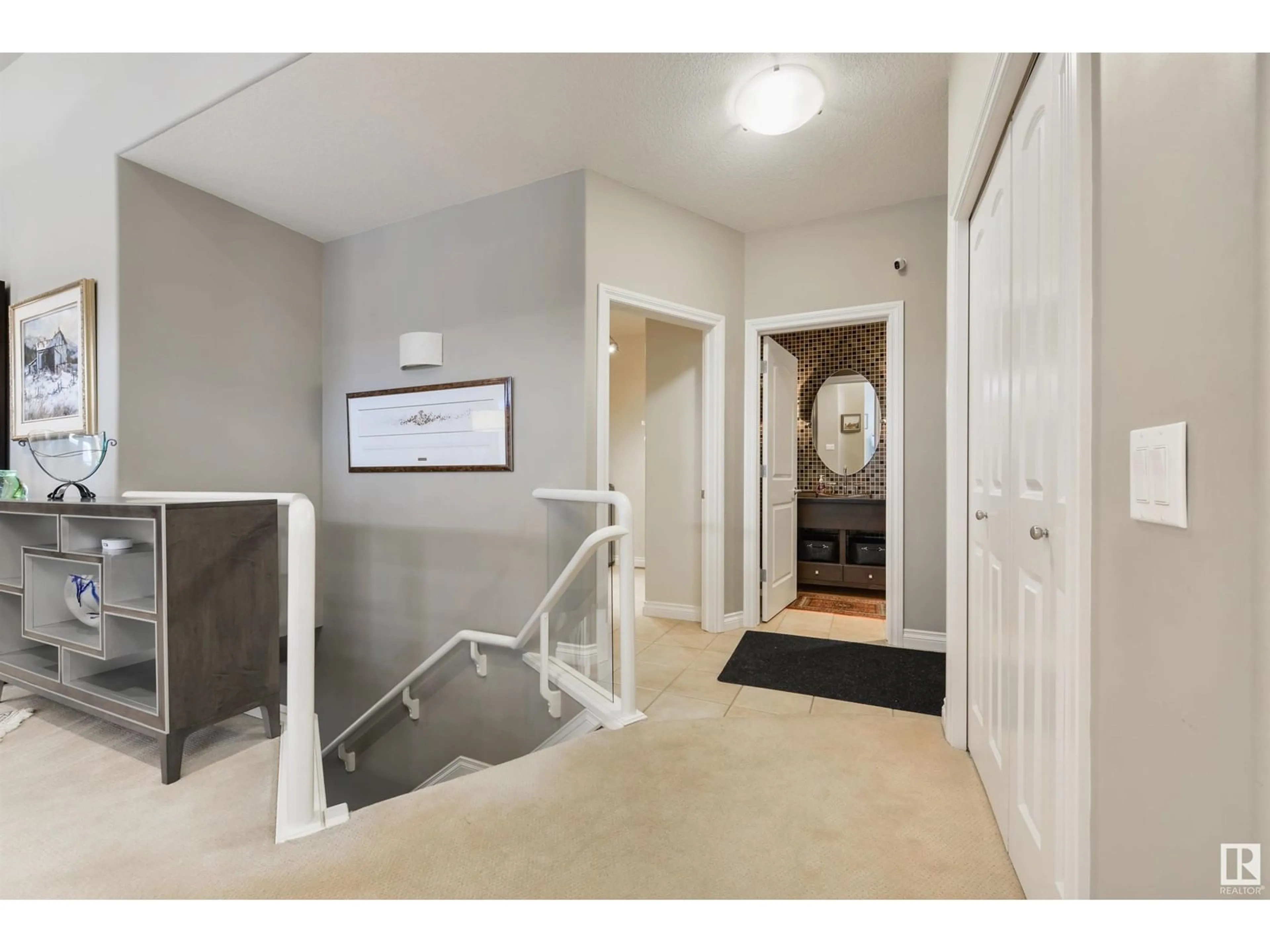 Indoor foyer, wood floors for #57 1225 WANYANDI RD NW, Edmonton Alberta T6M2W7