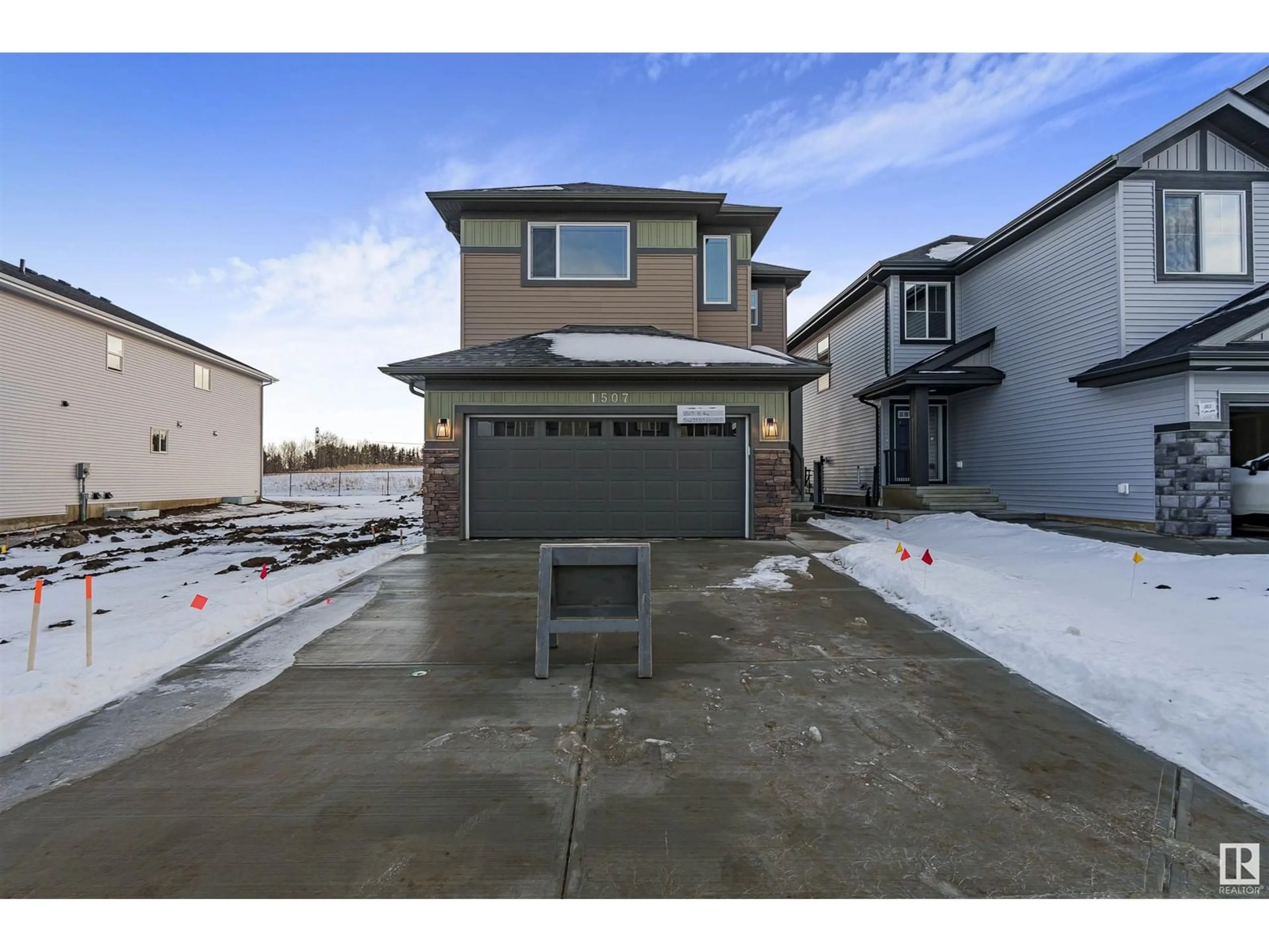 Frontside or backside of a home, the street view for 1507 11 AV NW, Edmonton Alberta T6T2W4