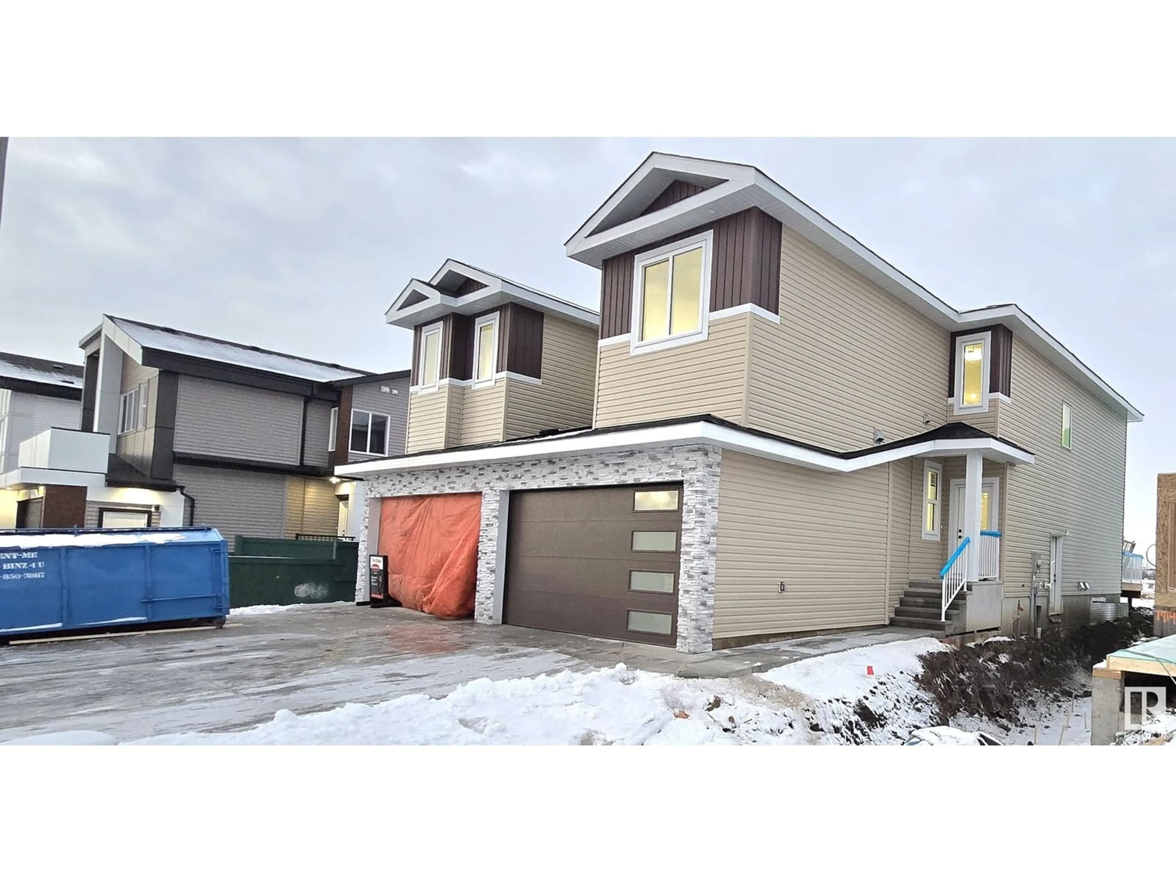 Frontside or backside of a home, the street view for 1916 155 AV NW, Edmonton Alberta T5Y4H8