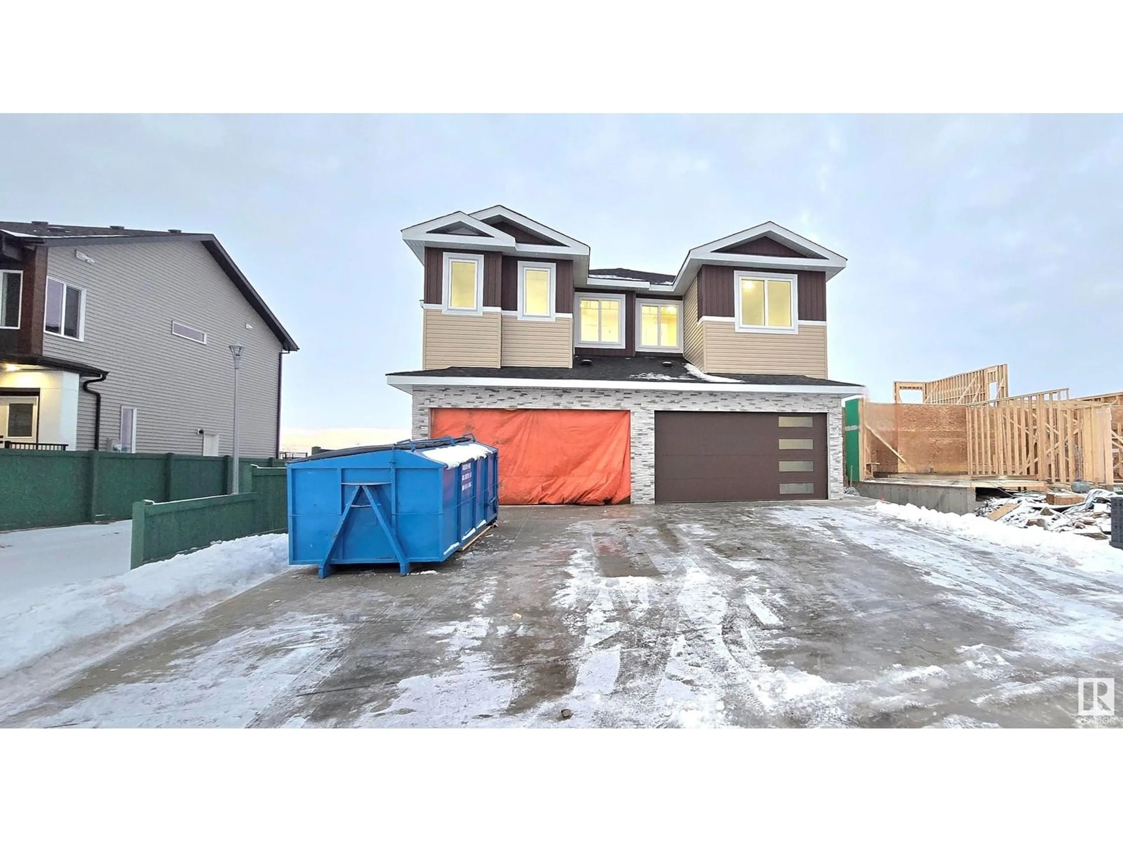 Frontside or backside of a home, the street view for 1916 155 AV NW, Edmonton Alberta T5Y4H8