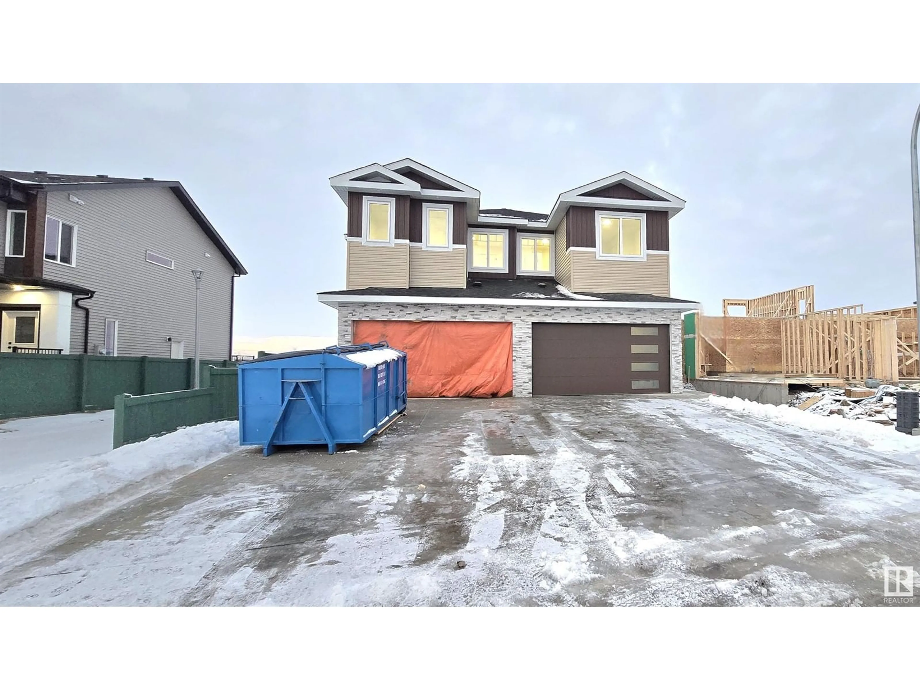 Frontside or backside of a home, the street view for 1918 155 AV NW, Edmonton Alberta T5Y4H8