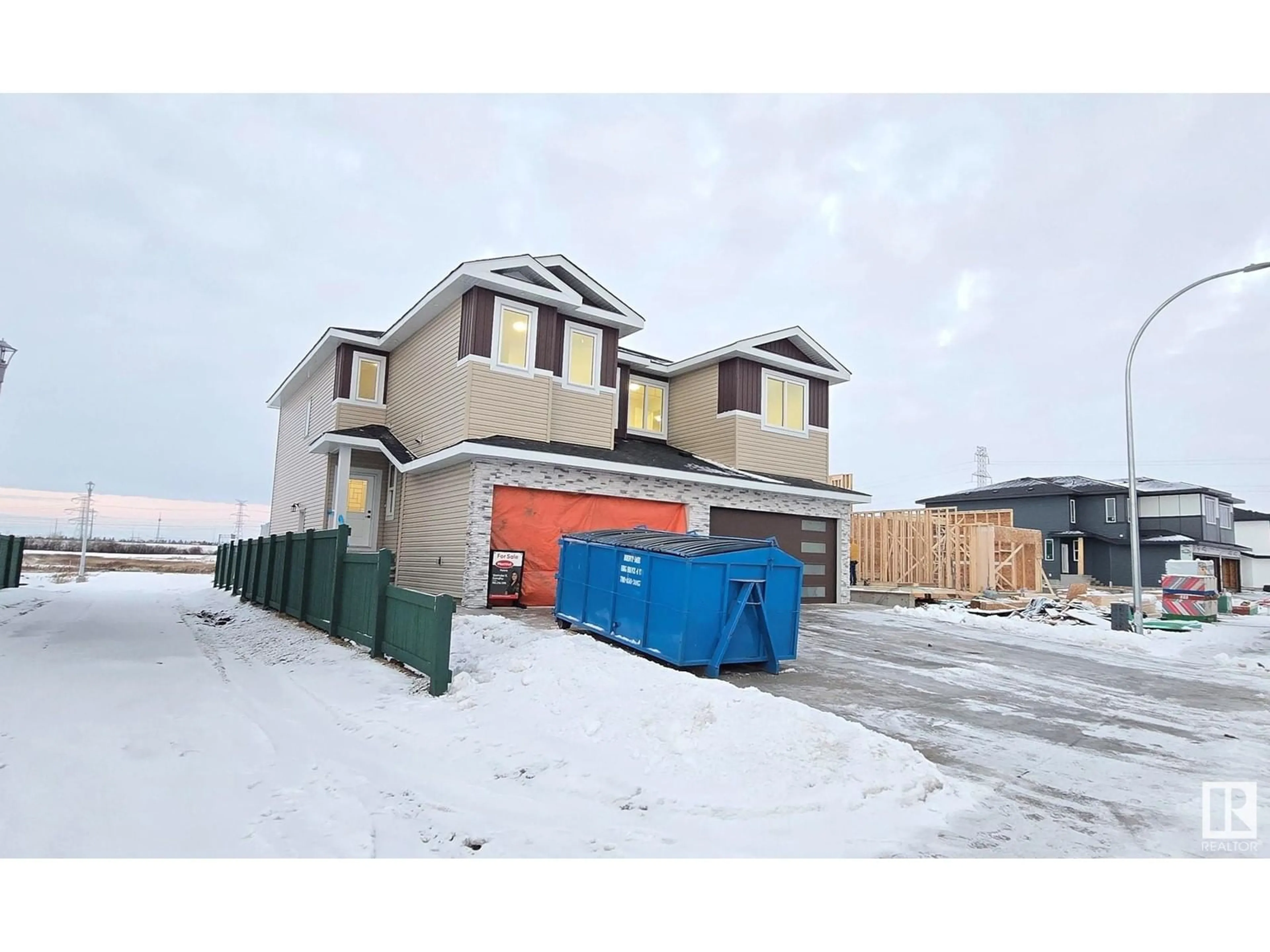 A pic from exterior of the house or condo, the street view for 1918 155 AV NW, Edmonton Alberta T5Y4H8