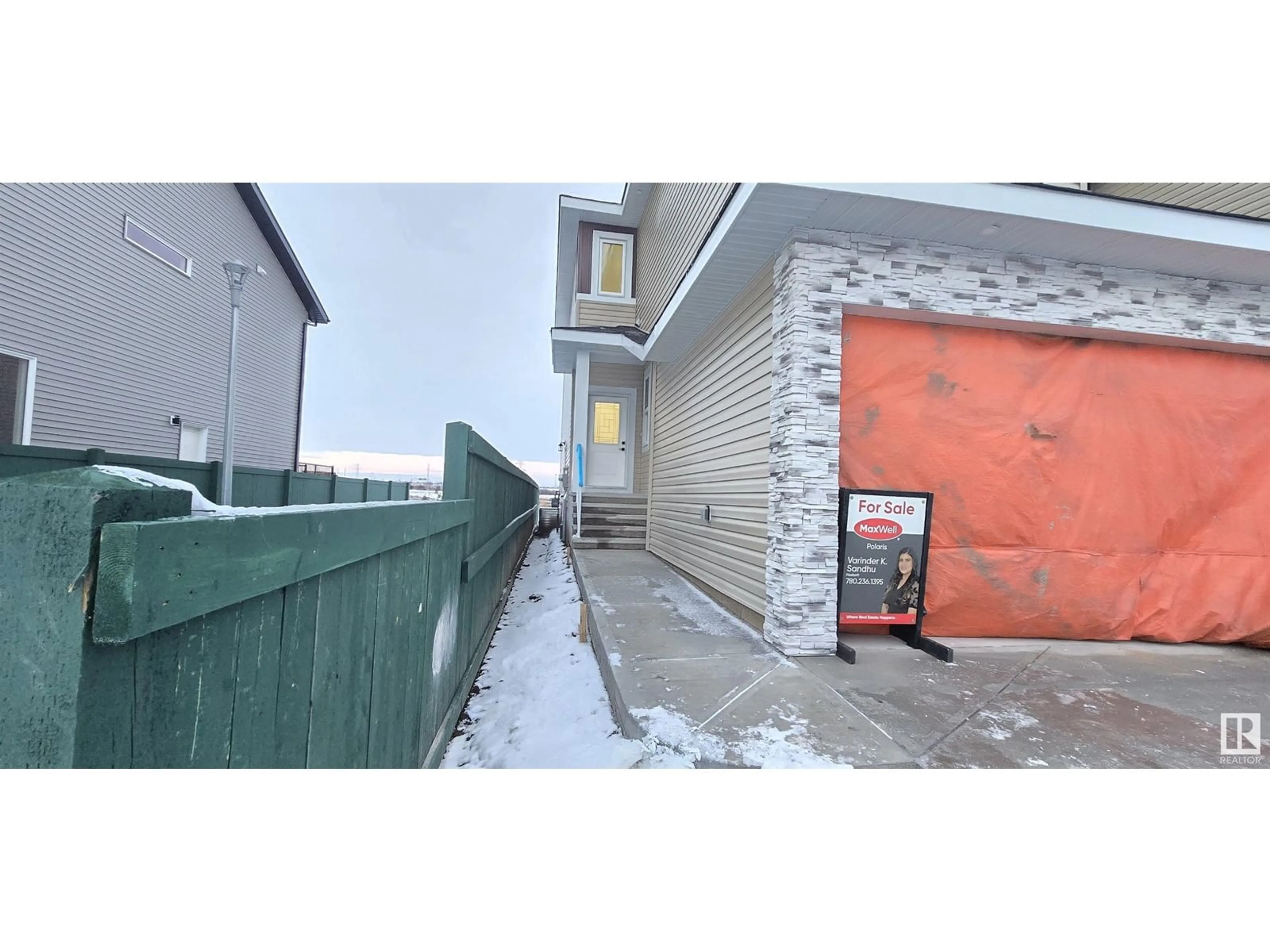 A pic from exterior of the house or condo, the street view for 1918 155 AV NW, Edmonton Alberta T5Y4H8