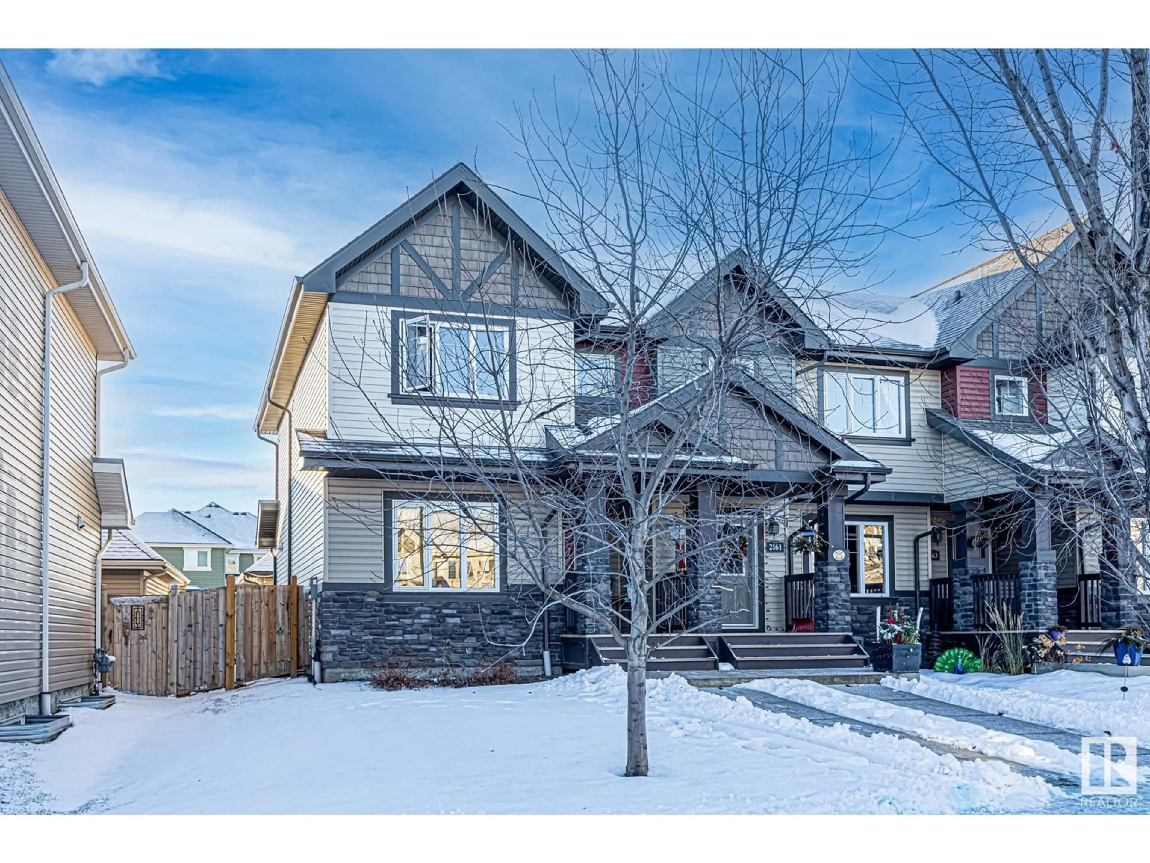 Frontside or backside of a home, the street view for 2159 TRUMPETER WY NW, Edmonton Alberta T5S0K2