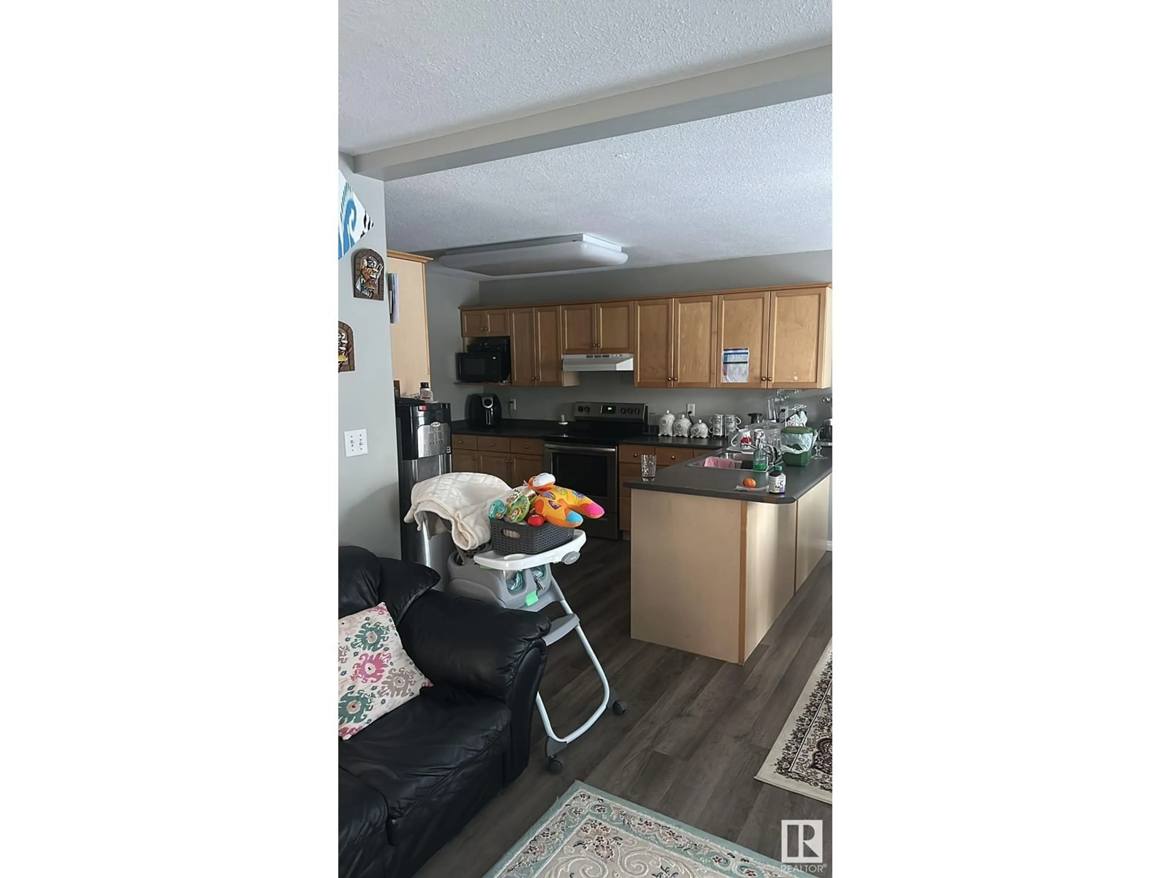 Open concept kitchen for 13540 149 AV NW, Edmonton Alberta T6V1M1