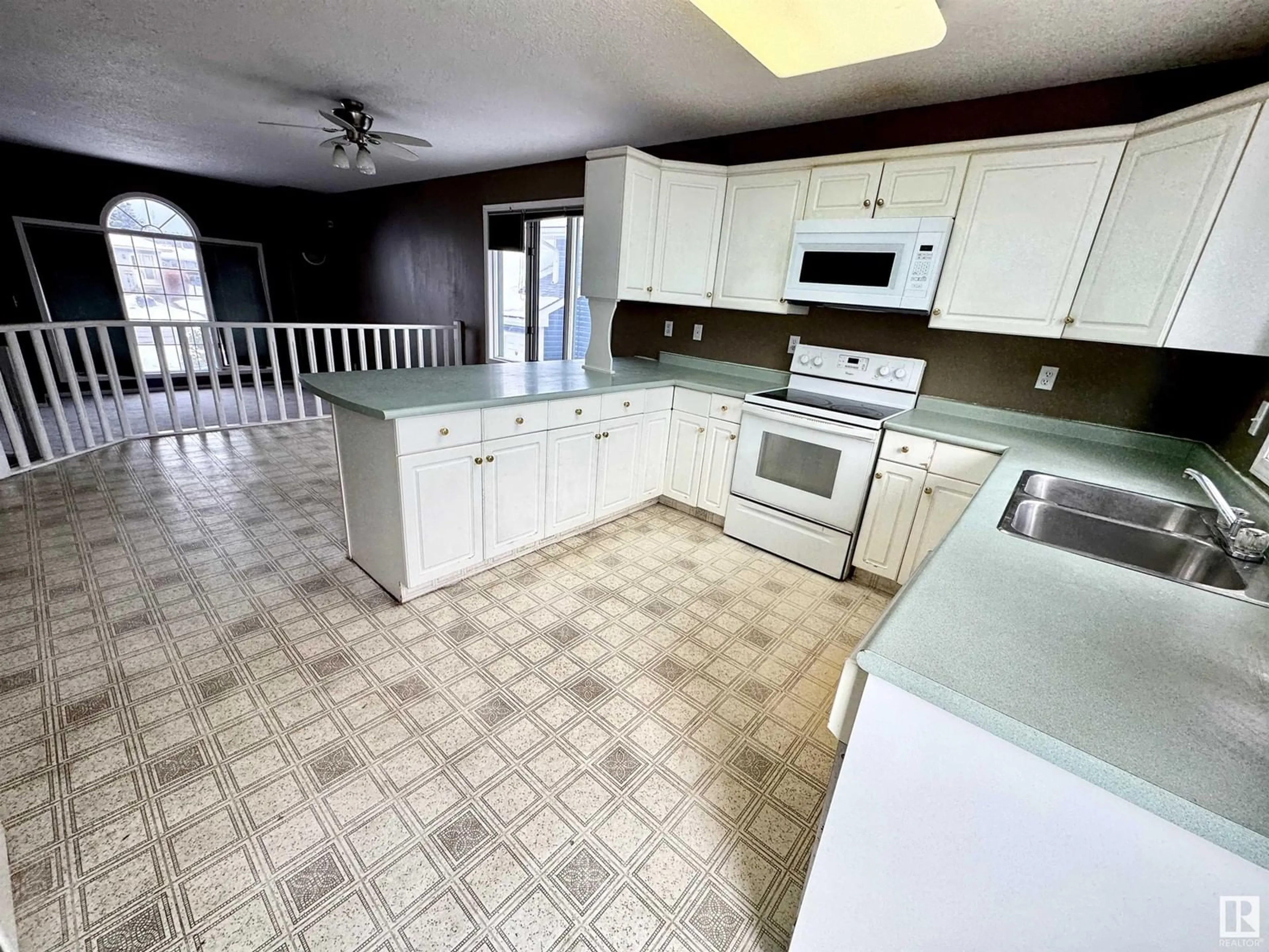 Open concept kitchen, ceramic/tile floor for 4008 55 AV, Whitecourt Alberta T7S1C5