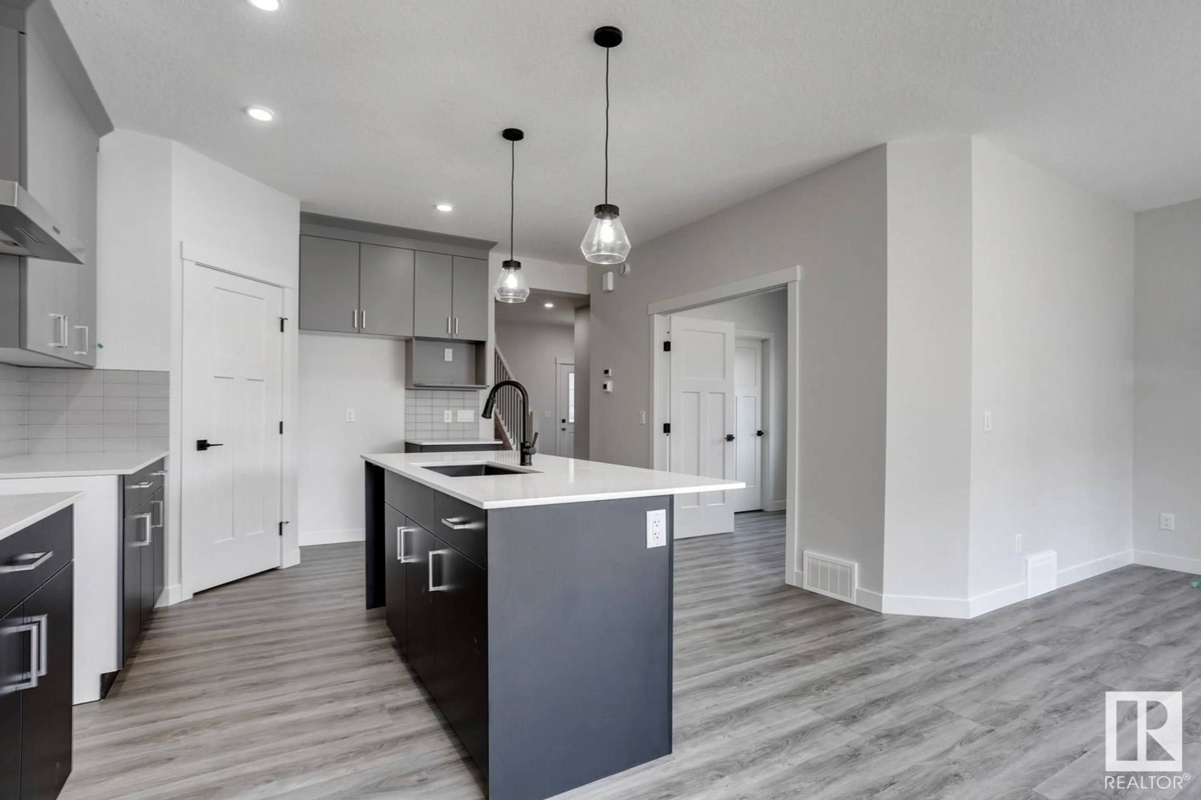 Open concept kitchen, unknown for 1205 16A AV NW, Edmonton Alberta T6T2V1