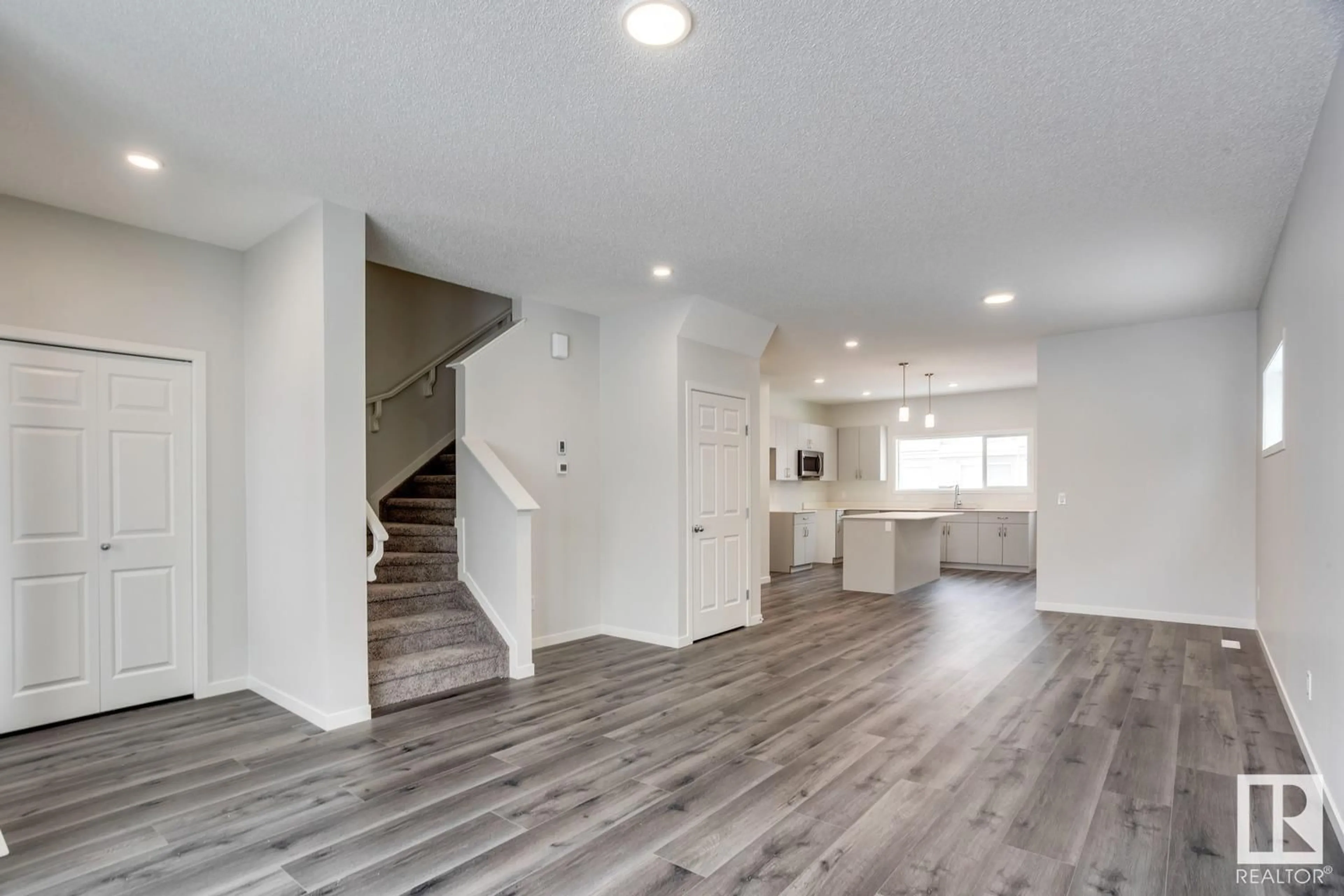 Open concept kitchen, unknown for 1643 16 AV NW, Edmonton Alberta T5Y0N4