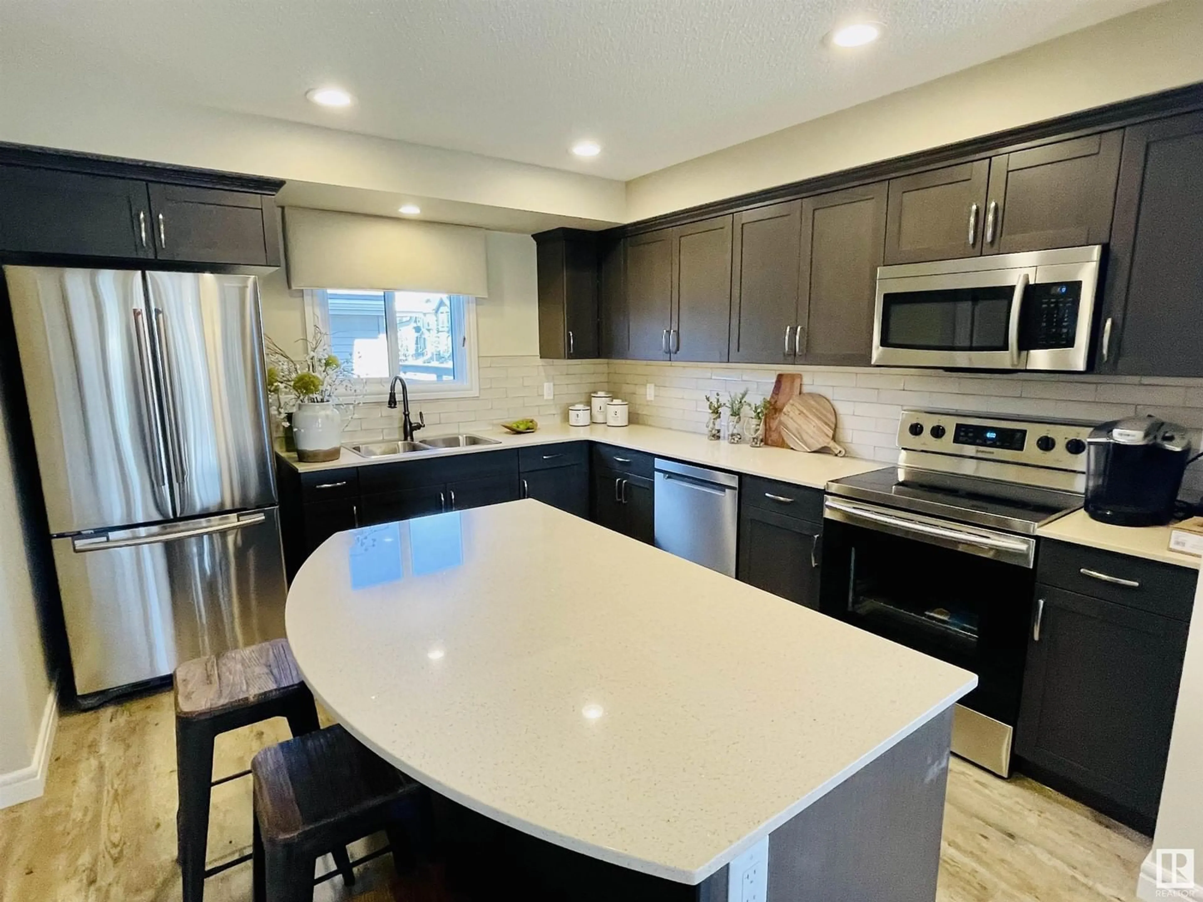 Open concept kitchen, ceramic/tile floor for 2107 DESROCHERS DR SW, Edmonton Alberta T6W1A7