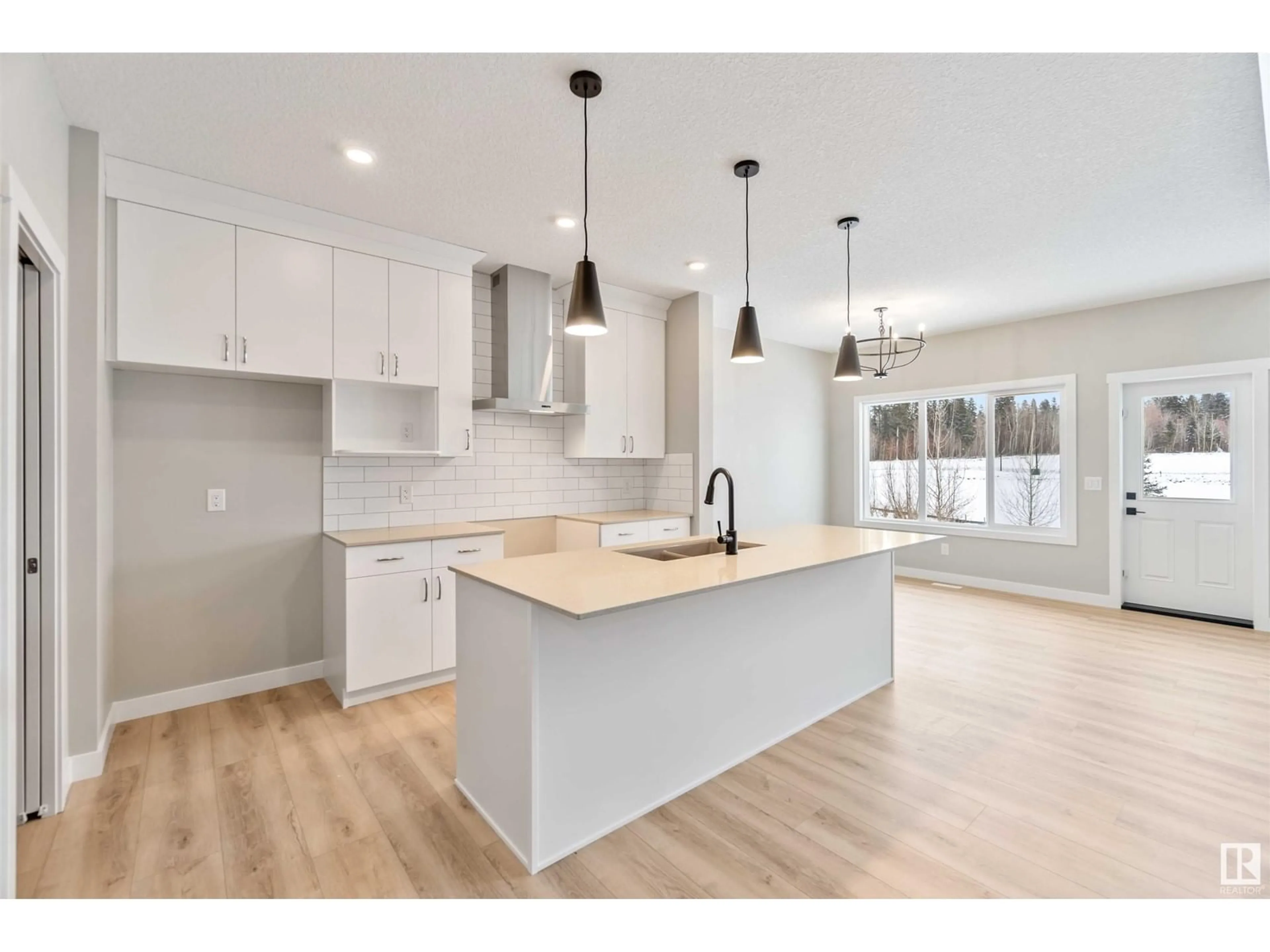 Open concept kitchen, wood/laminate floor for 22 Meadowbrook WY, Spruce Grove Alberta T7X0W2