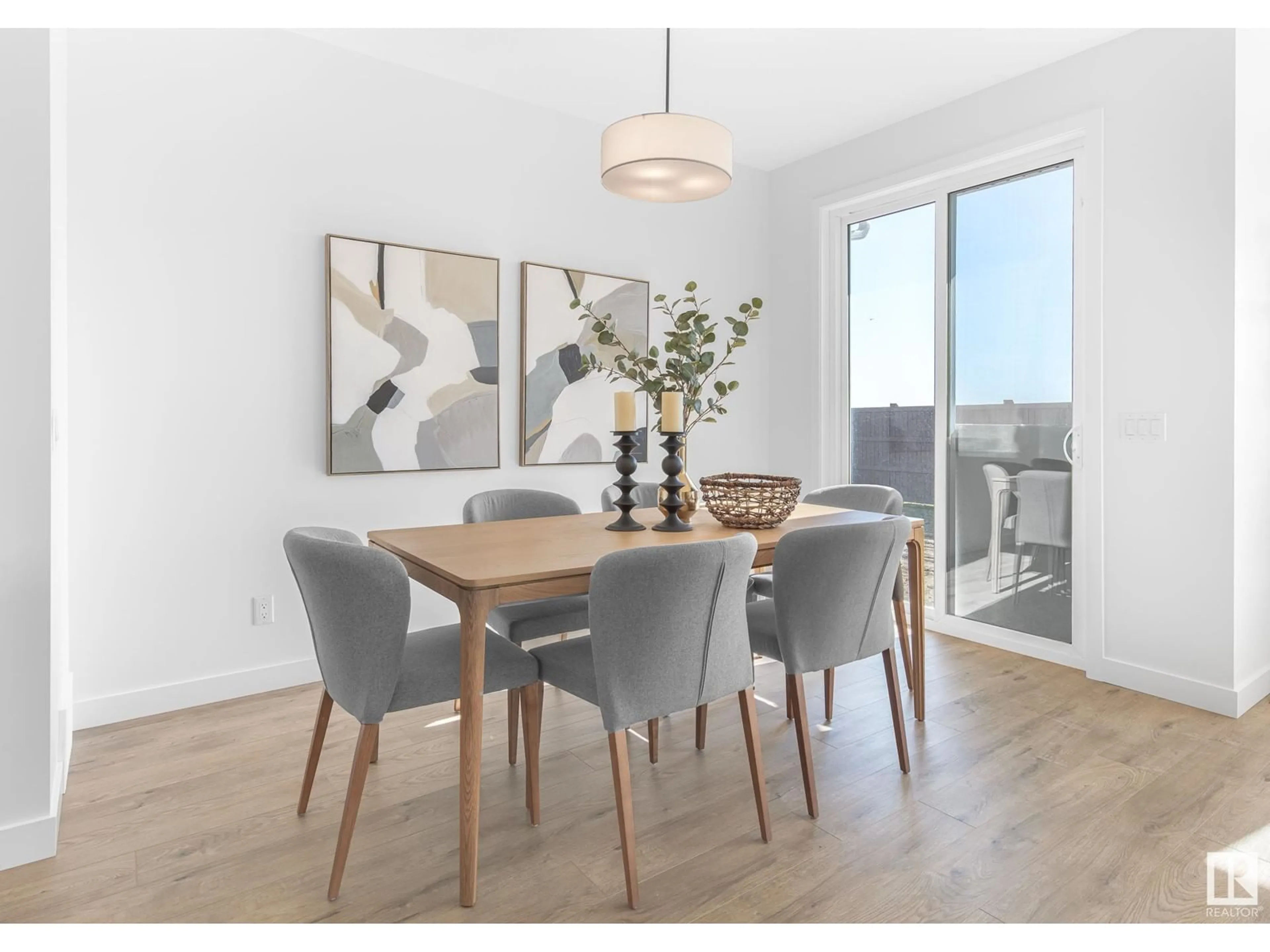 Dining room, wood/laminate floor for 4817 CAWSEY TC SW, Edmonton Alberta T6W5M7