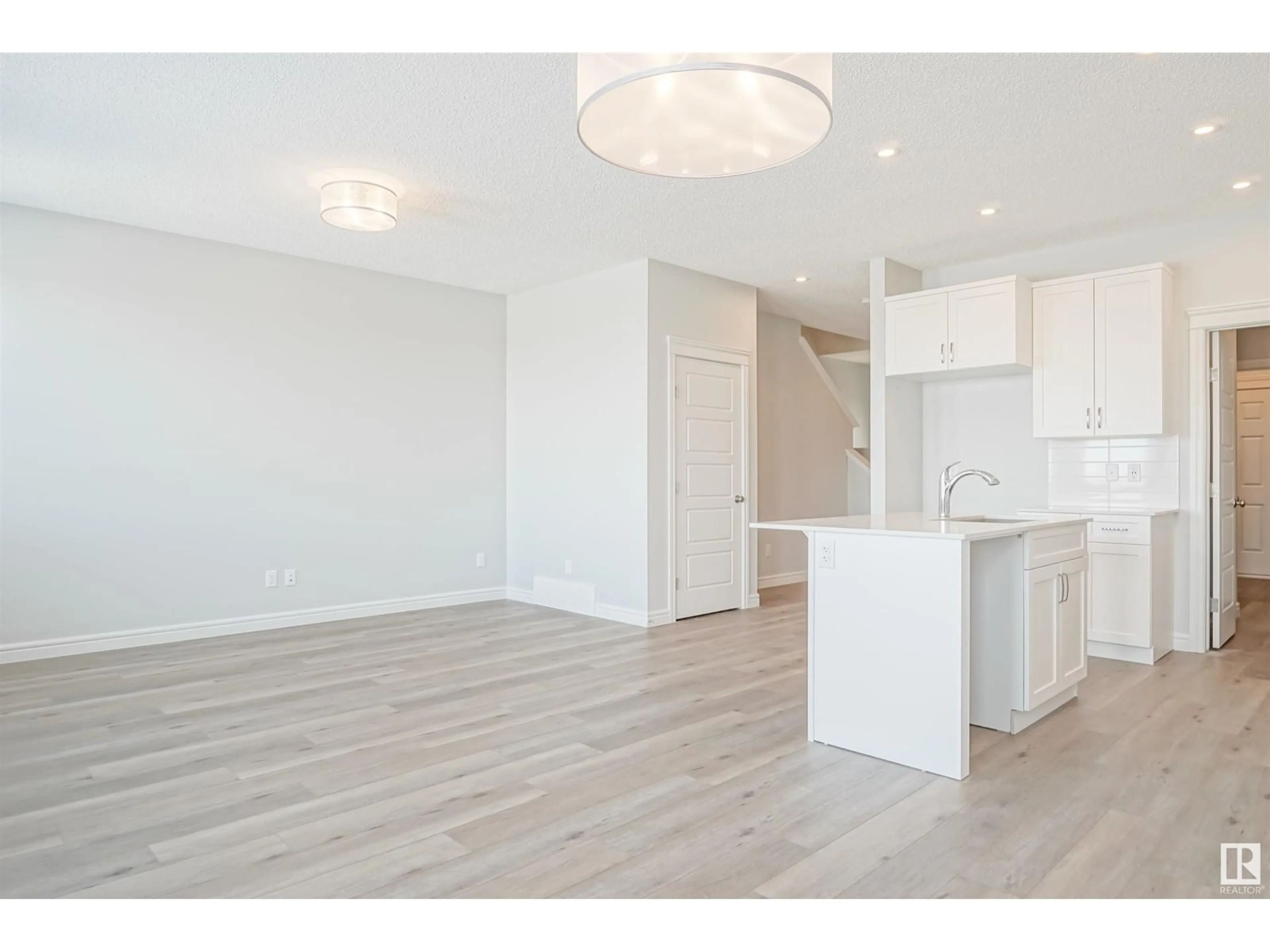 Open concept kitchen, wood/laminate floor for 51 NETTLE CR, St. Albert Alberta T8L0Z5