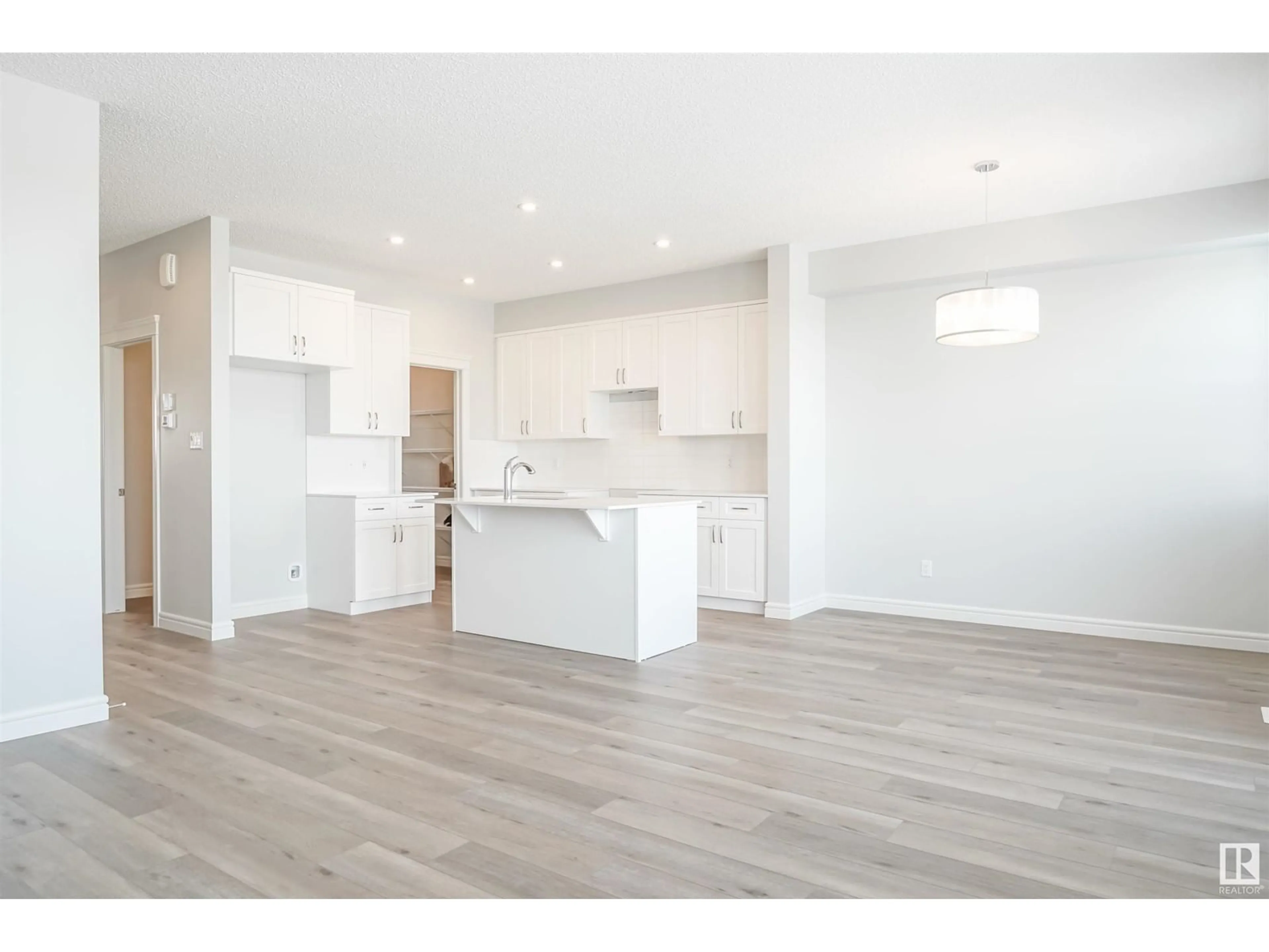 Open concept kitchen, wood/laminate floor for 51 NETTLE CR, St. Albert Alberta T8L0Z5