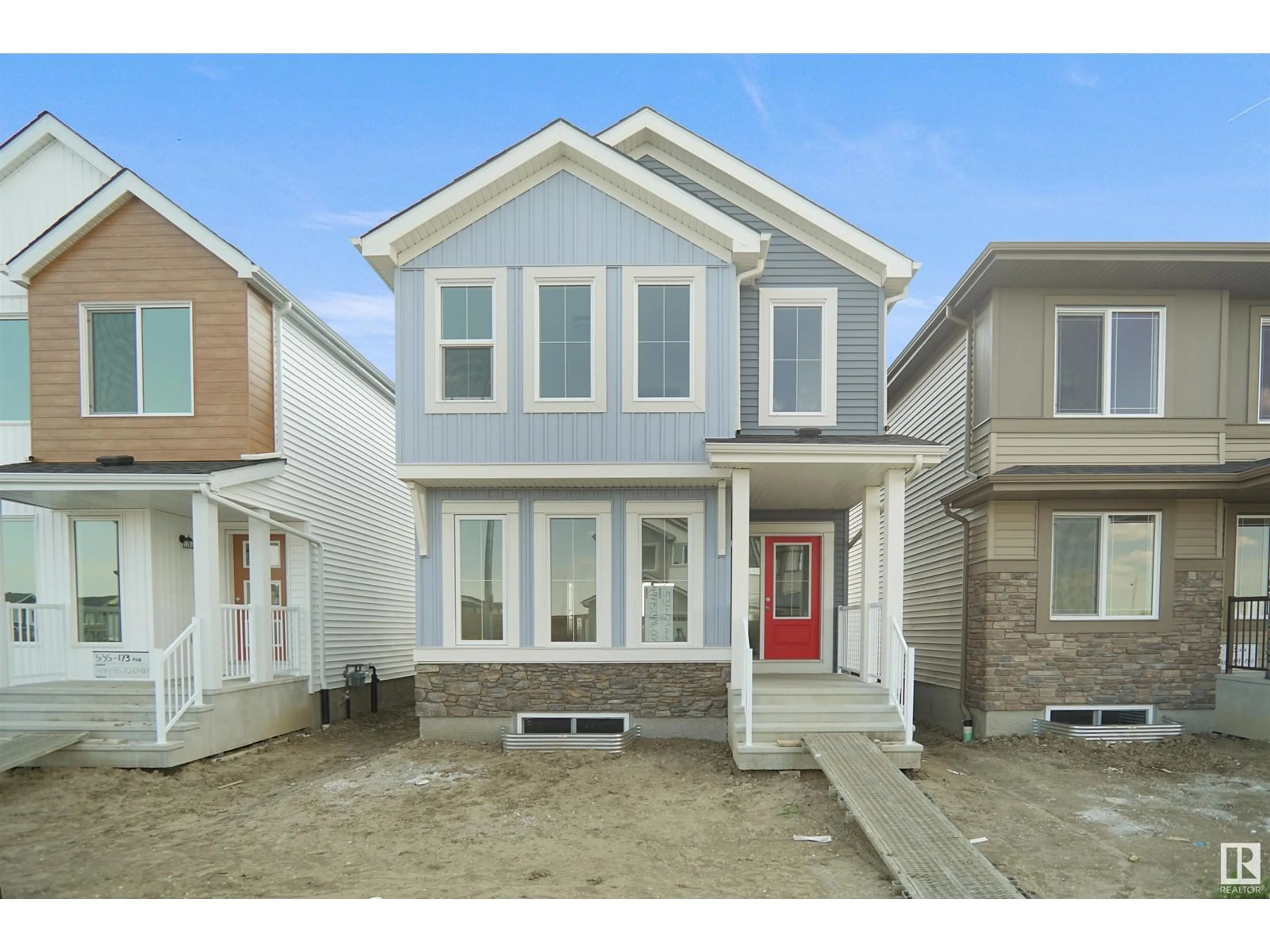 Home with vinyl exterior material, street for NE - 17318 6A ST, Edmonton Alberta T5Y4E8