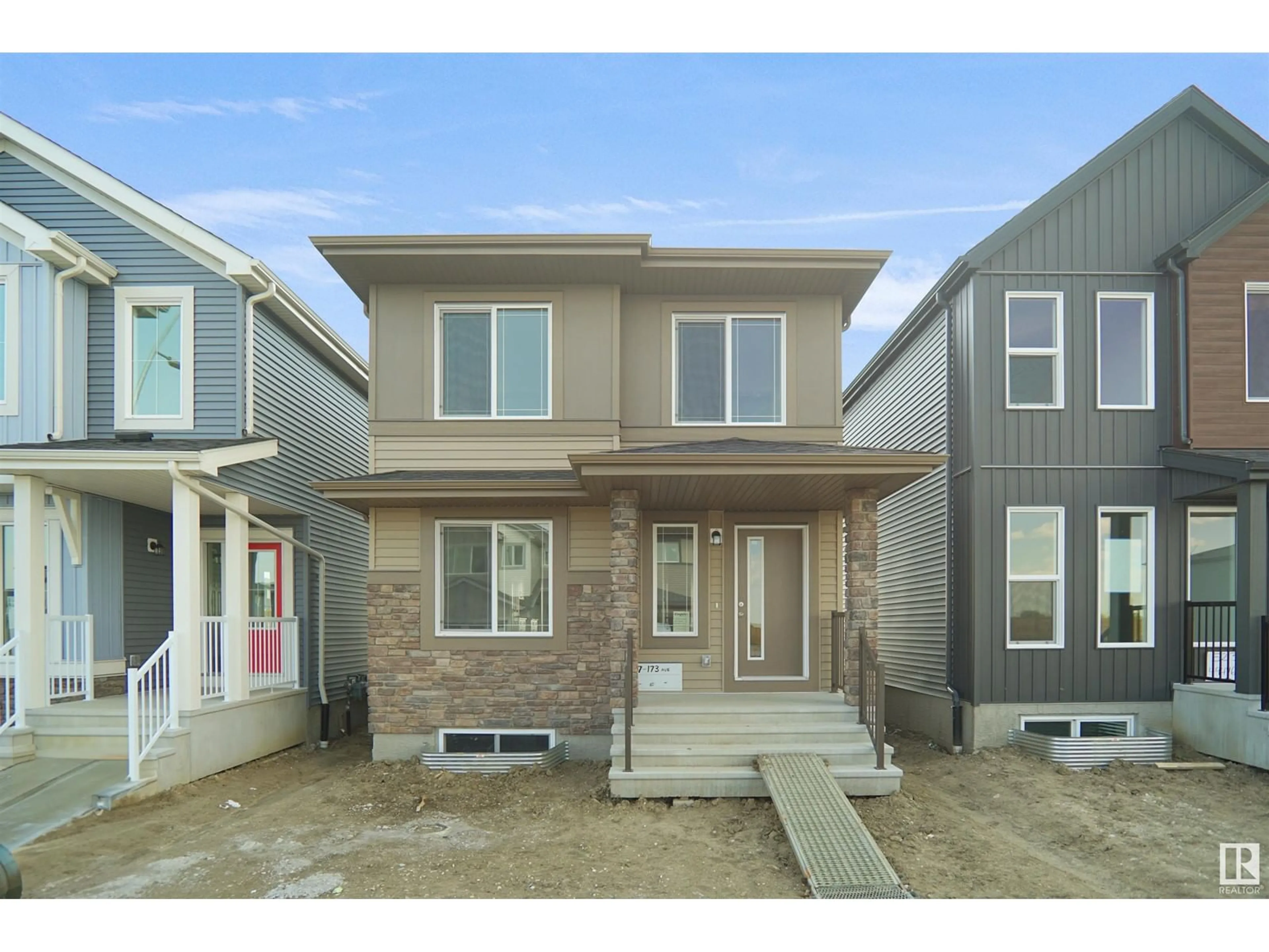 Home with vinyl exterior material, street for 17326 6A ST NE, Edmonton Alberta T5Y4E8