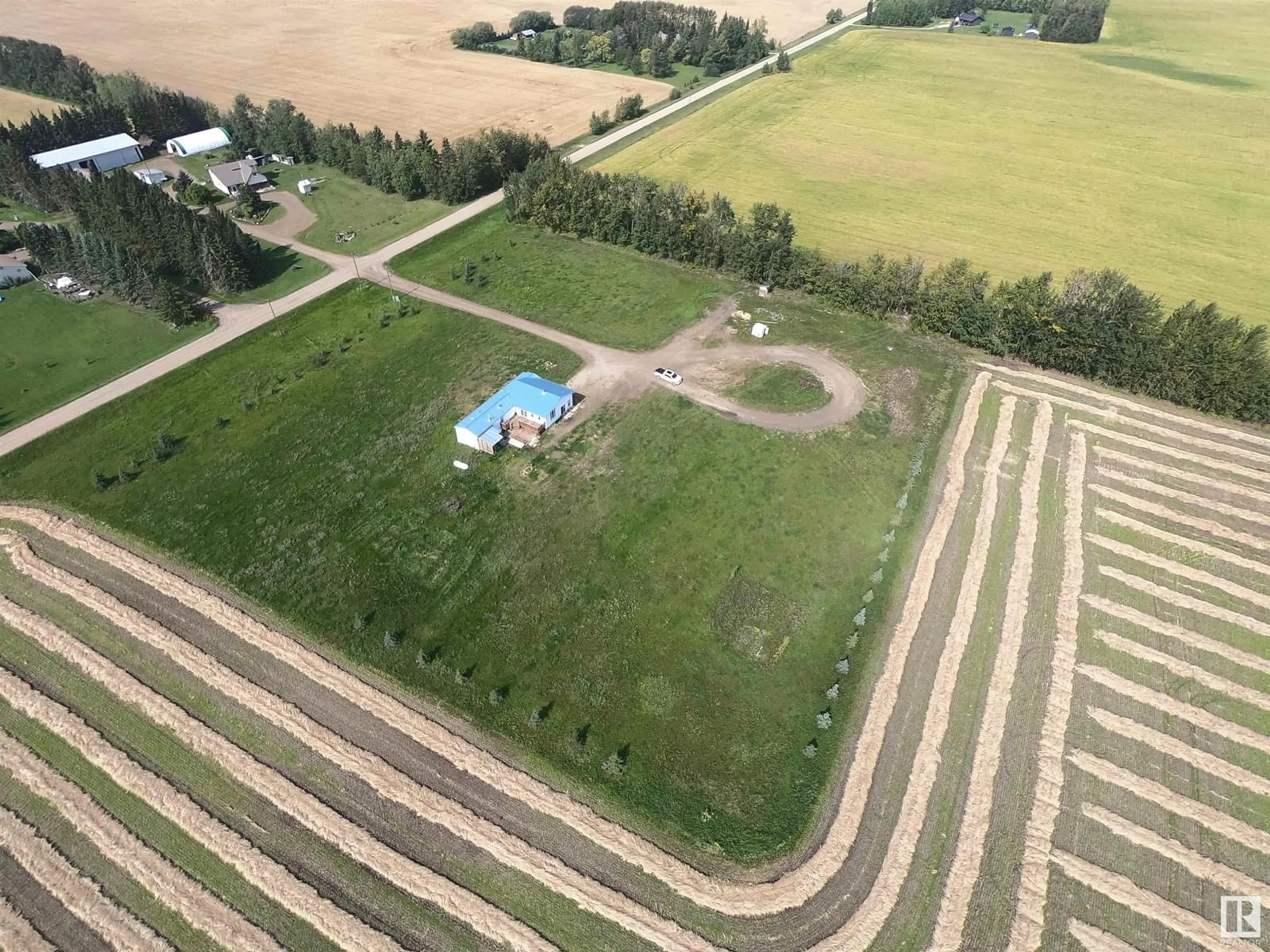 A pic from outside/outdoor area/front of a property/back of a property/a pic from drone, building for 61515 Rg Rd 261, Rural Westlock County Alberta T0G0S0