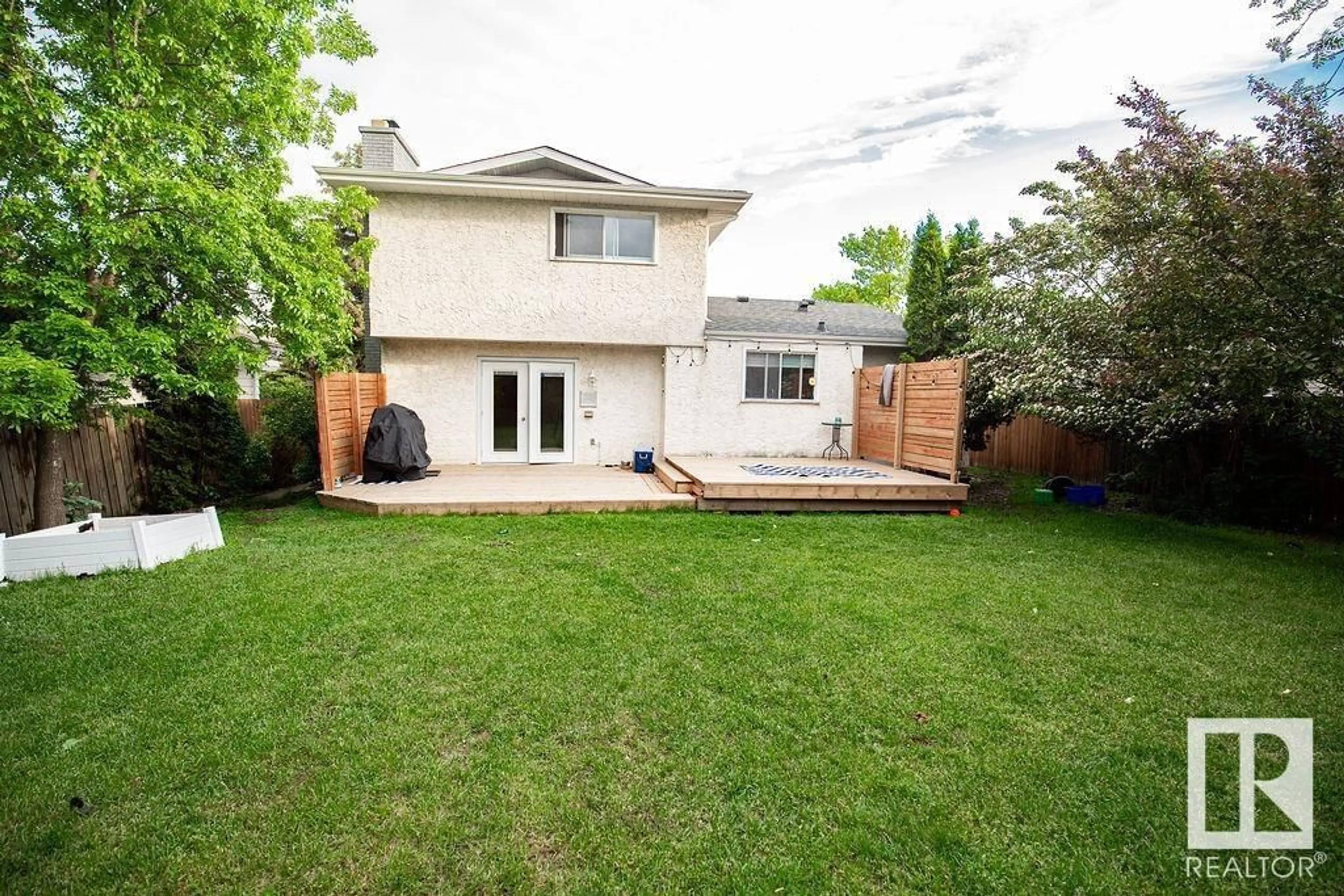 Patio, street for 615 WAHSTAO RD NW, Edmonton Alberta T5T2Y3