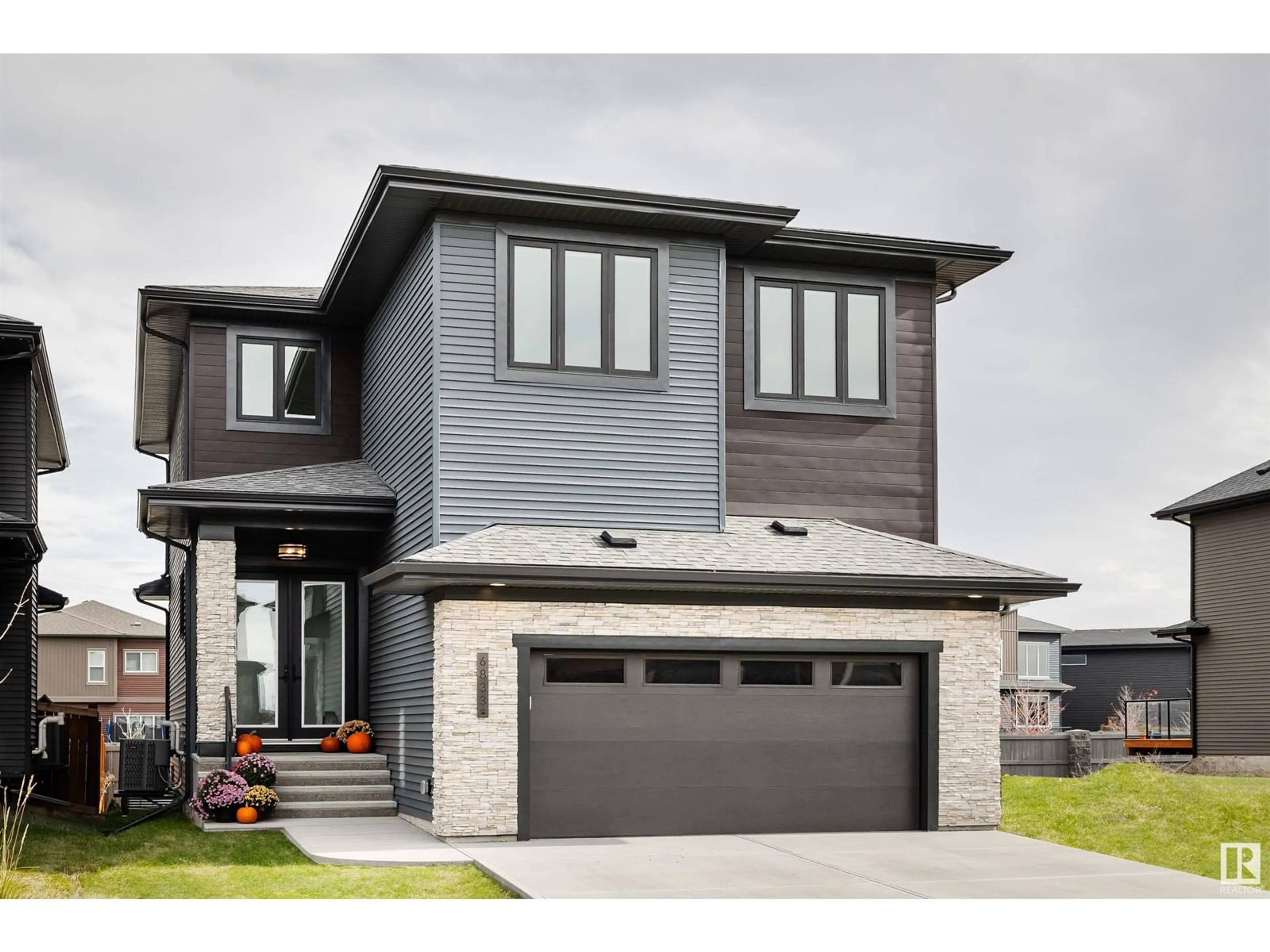 Home with brick exterior material, street for 6888 Knox Loop SW SW, Edmonton Alberta T6W4R4