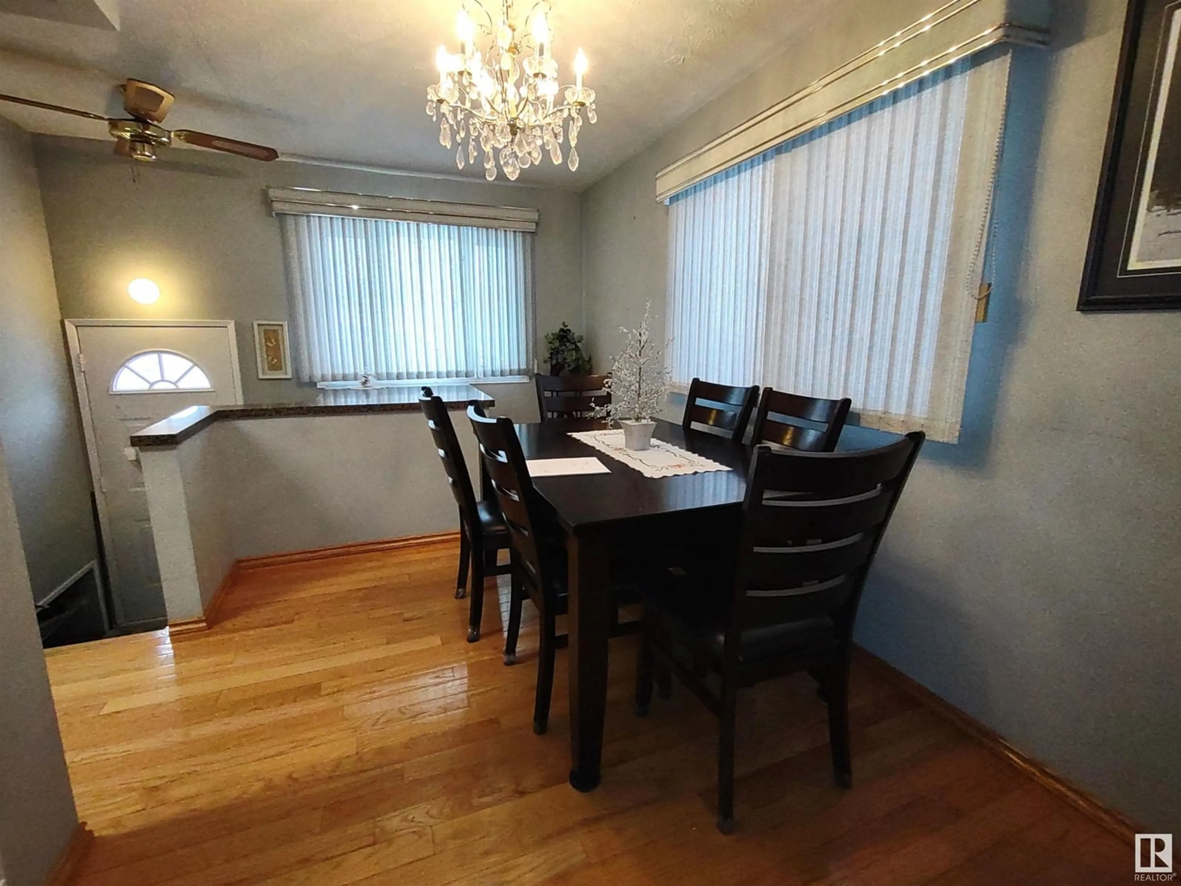 Dining room, wood/laminate floor for 13223 63 ST NW, Edmonton Alberta T5A0W9