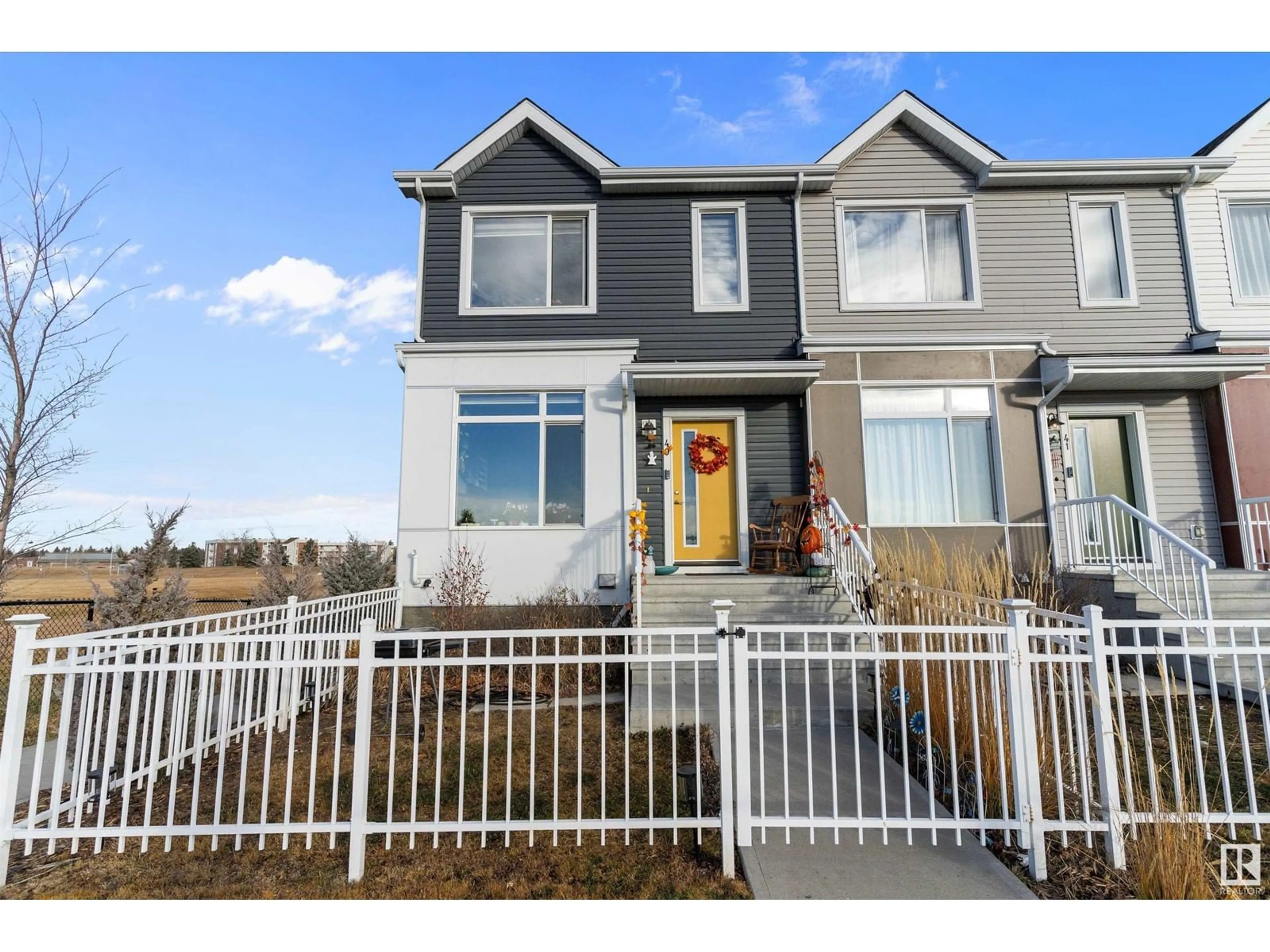 Home with vinyl exterior material, street for #40 215 SADDLEBACK RD NW, Edmonton Alberta T6J5T6