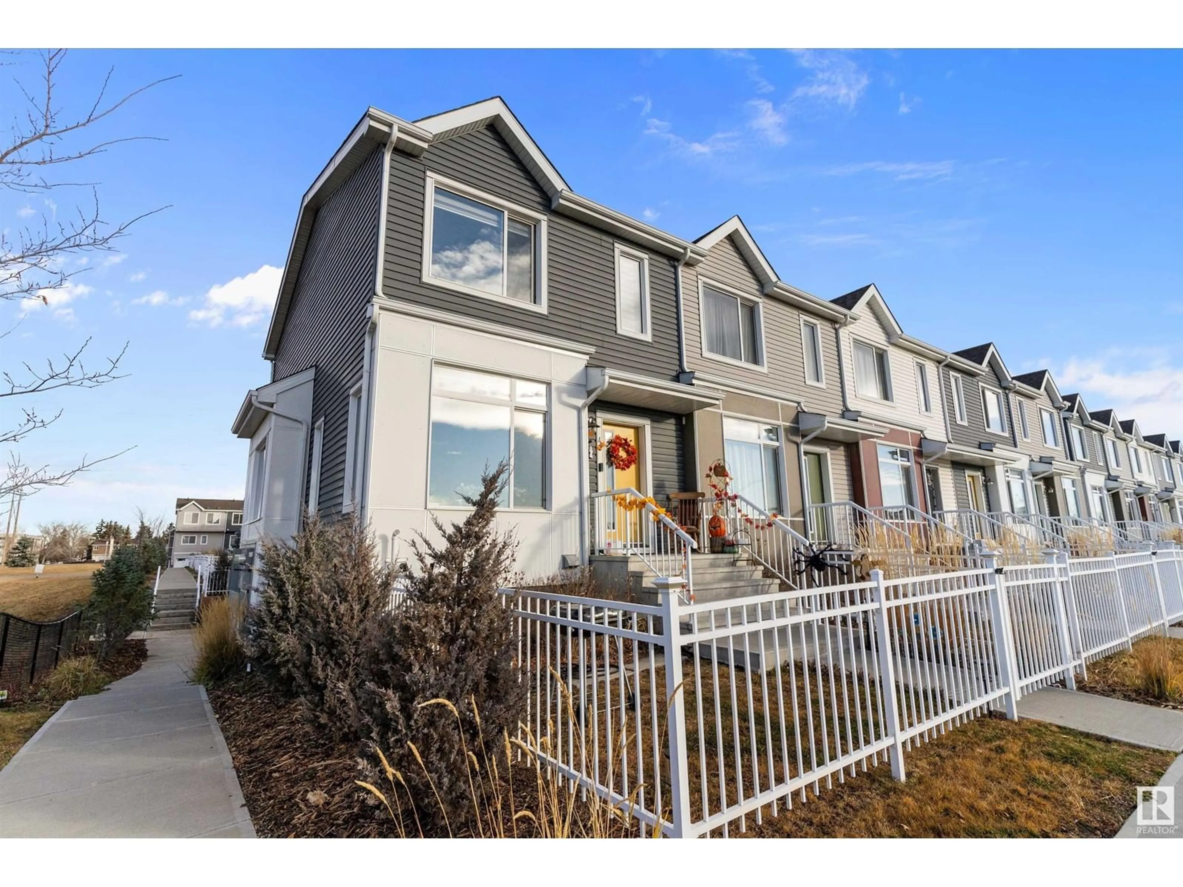 Home with vinyl exterior material, street for #40 215 SADDLEBACK RD NW, Edmonton Alberta T6J5T6