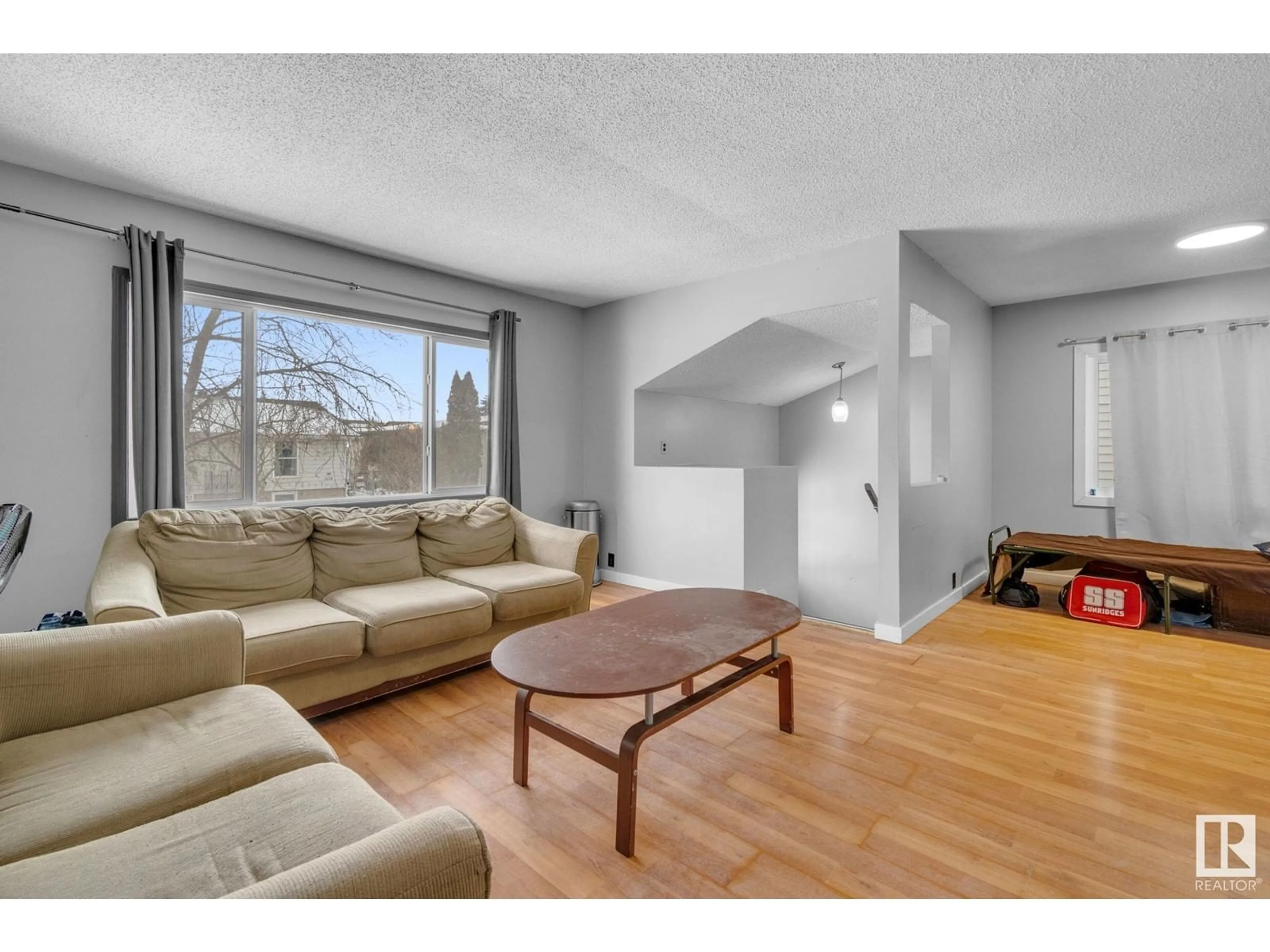 Living room with furniture, unknown for 2111 53 ST NW, Edmonton Alberta T6L4T8