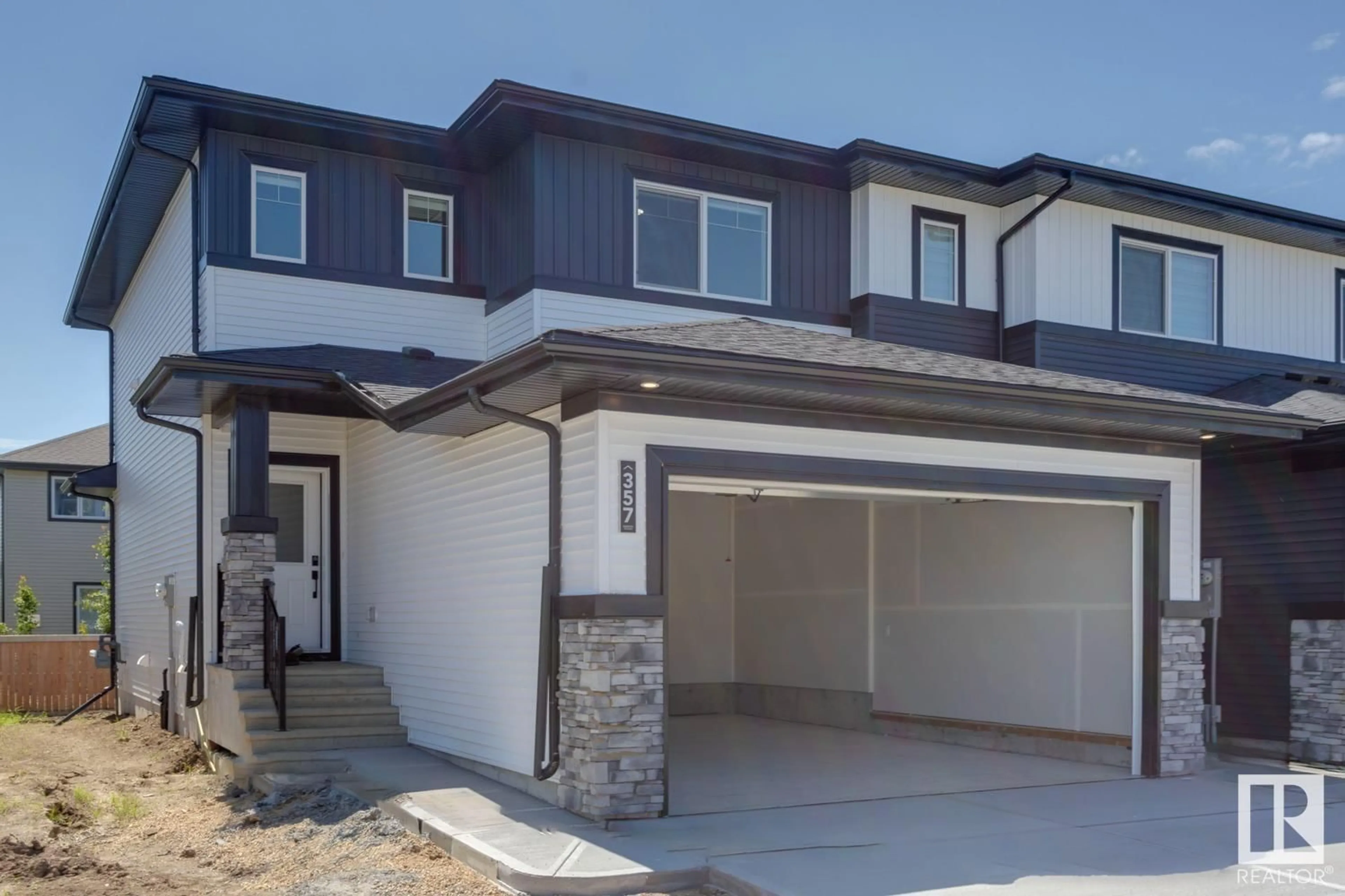 Home with vinyl exterior material, street for 336 GENESIS VI, Stony Plain Alberta T7Z0J6