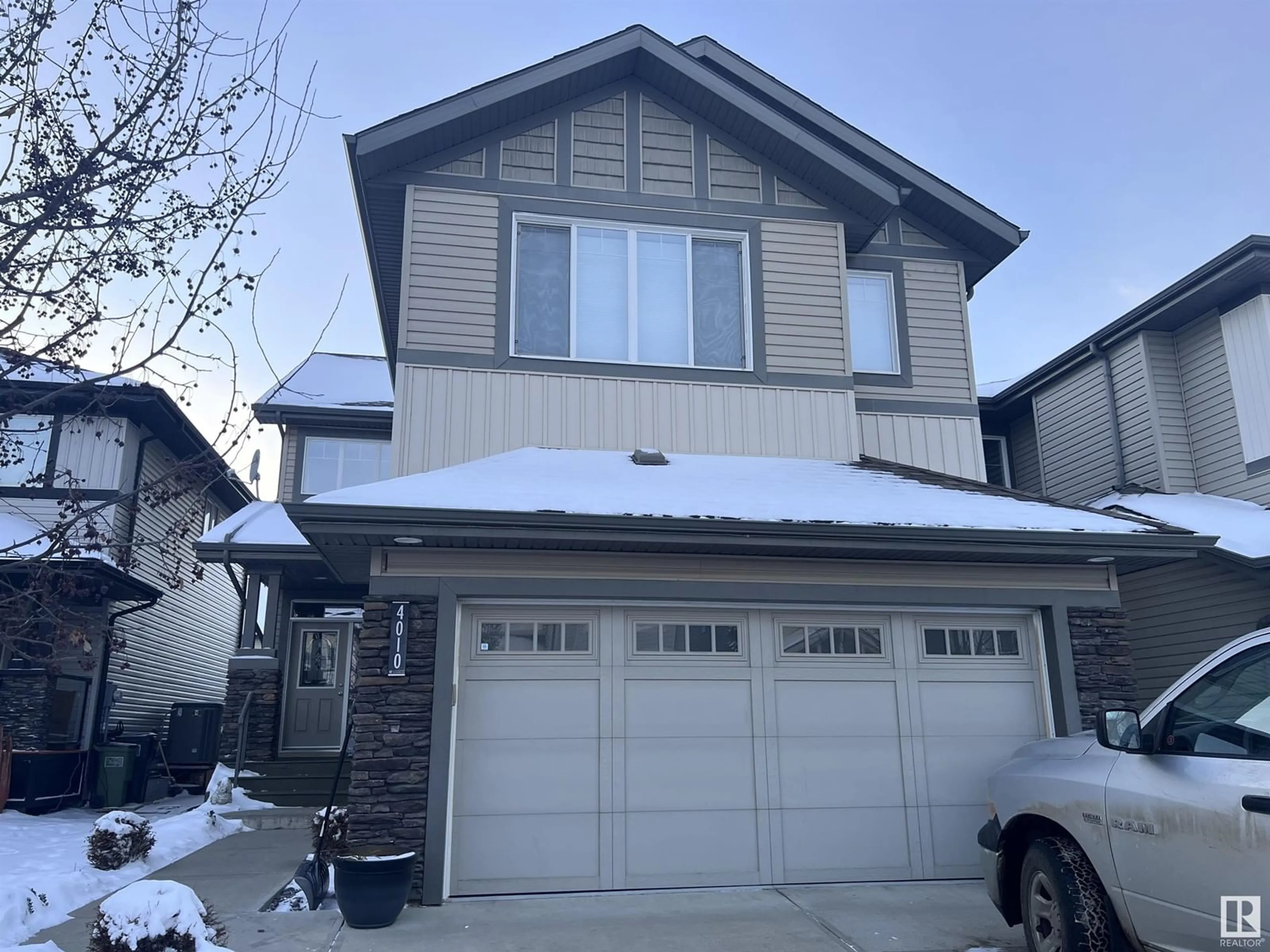 Home with vinyl exterior material, street for 4010 CHARLES PL SW SW, Edmonton Alberta T6W0Z3