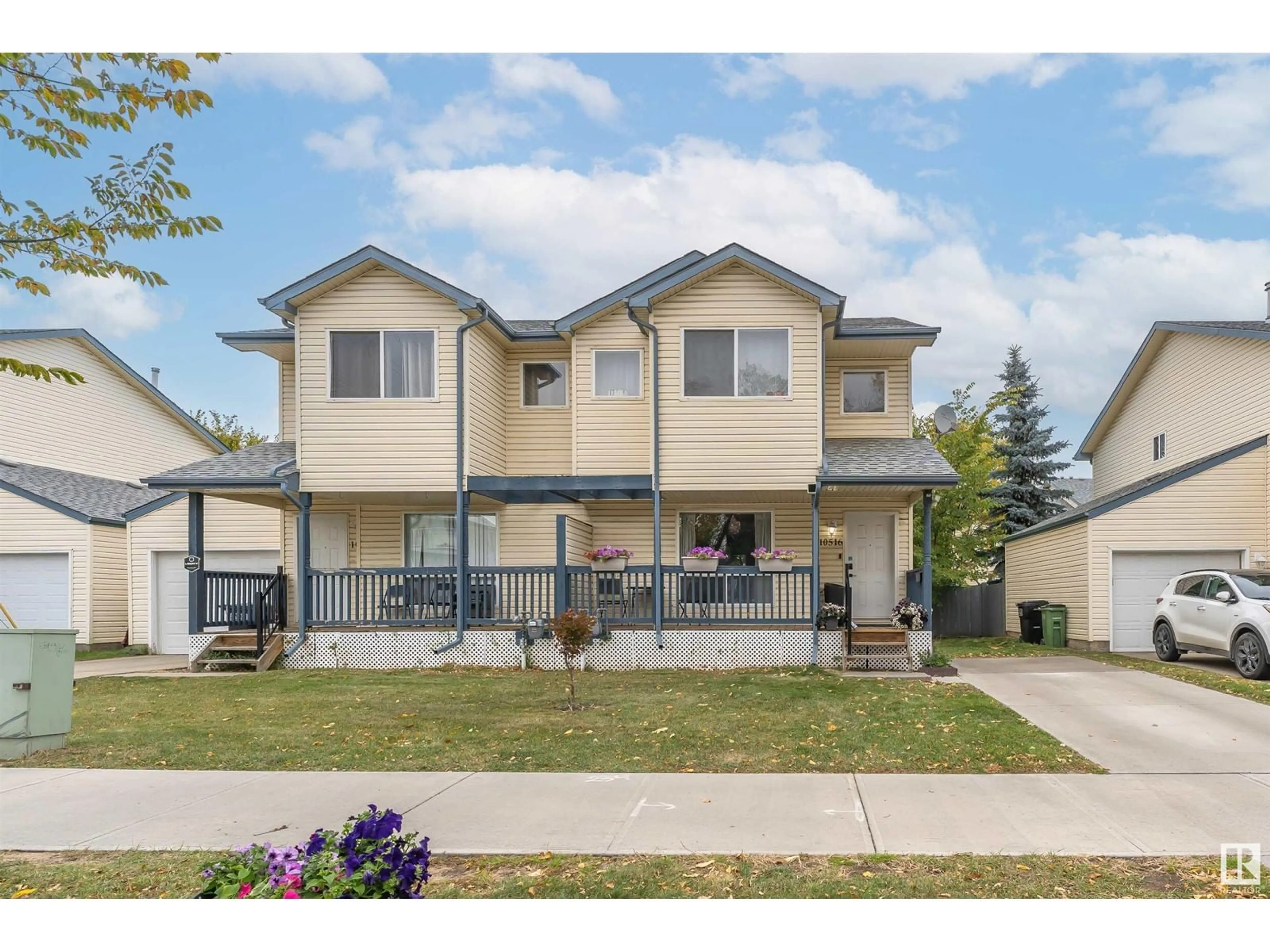 Home with vinyl exterior material, street for 10516 108 AV NW, Edmonton Alberta T5H4M8