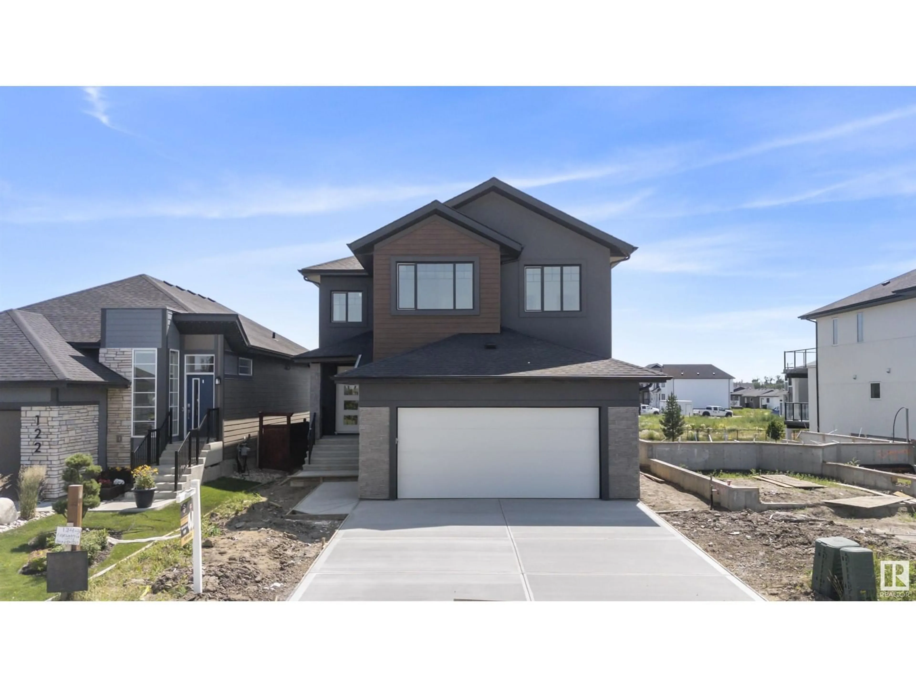 Home with vinyl exterior material, street for 124 EDGEWATER CI, Leduc Alberta T9E1K5