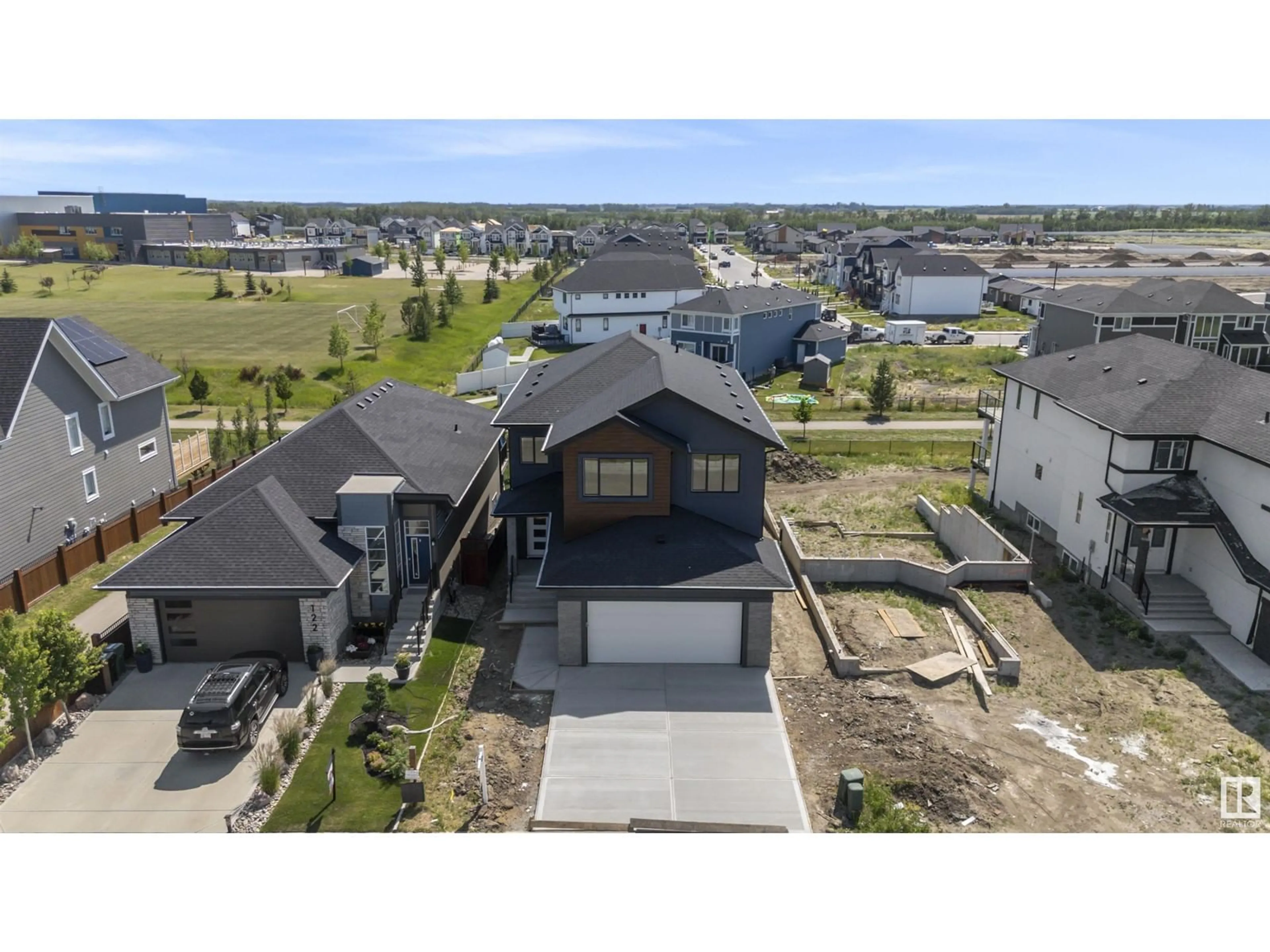 A pic from outside/outdoor area/front of a property/back of a property/a pic from drone, unknown for 124 EDGEWATER CI, Leduc Alberta T9E1K5