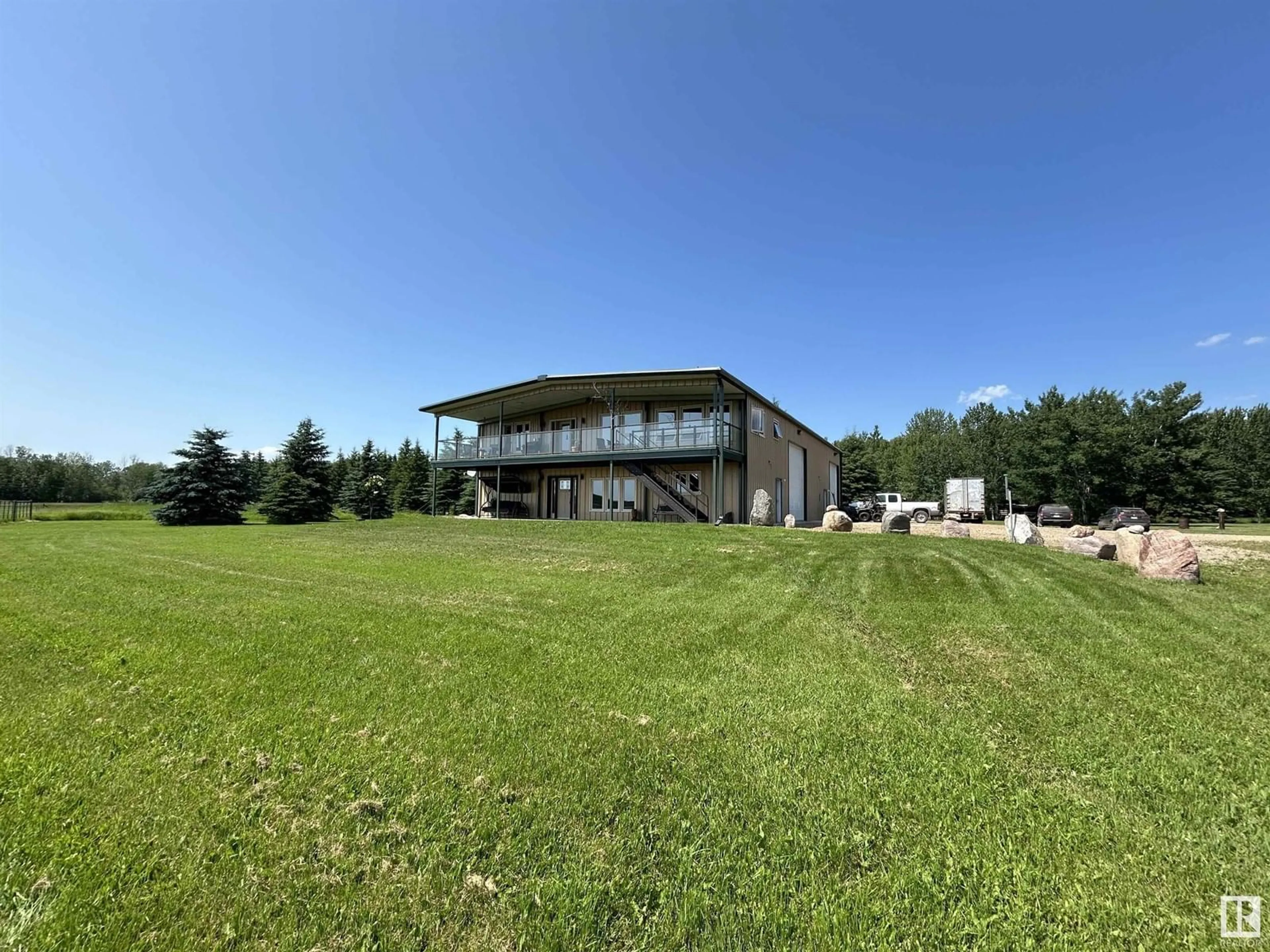 A pic from outside/outdoor area/front of a property/back of a property/a pic from drone, building for 24001 TWP RD 604, Rural Westlock County Alberta T0G0P0