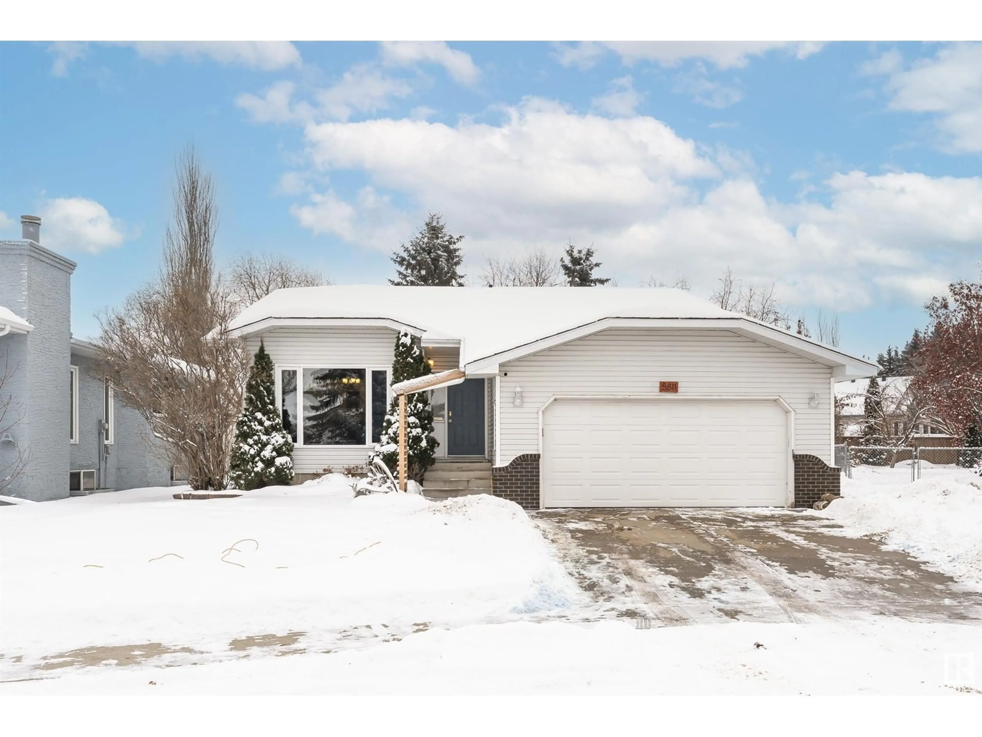 Home with vinyl exterior material, street for 5811 48 AV, Beaumont Alberta T4X1C1