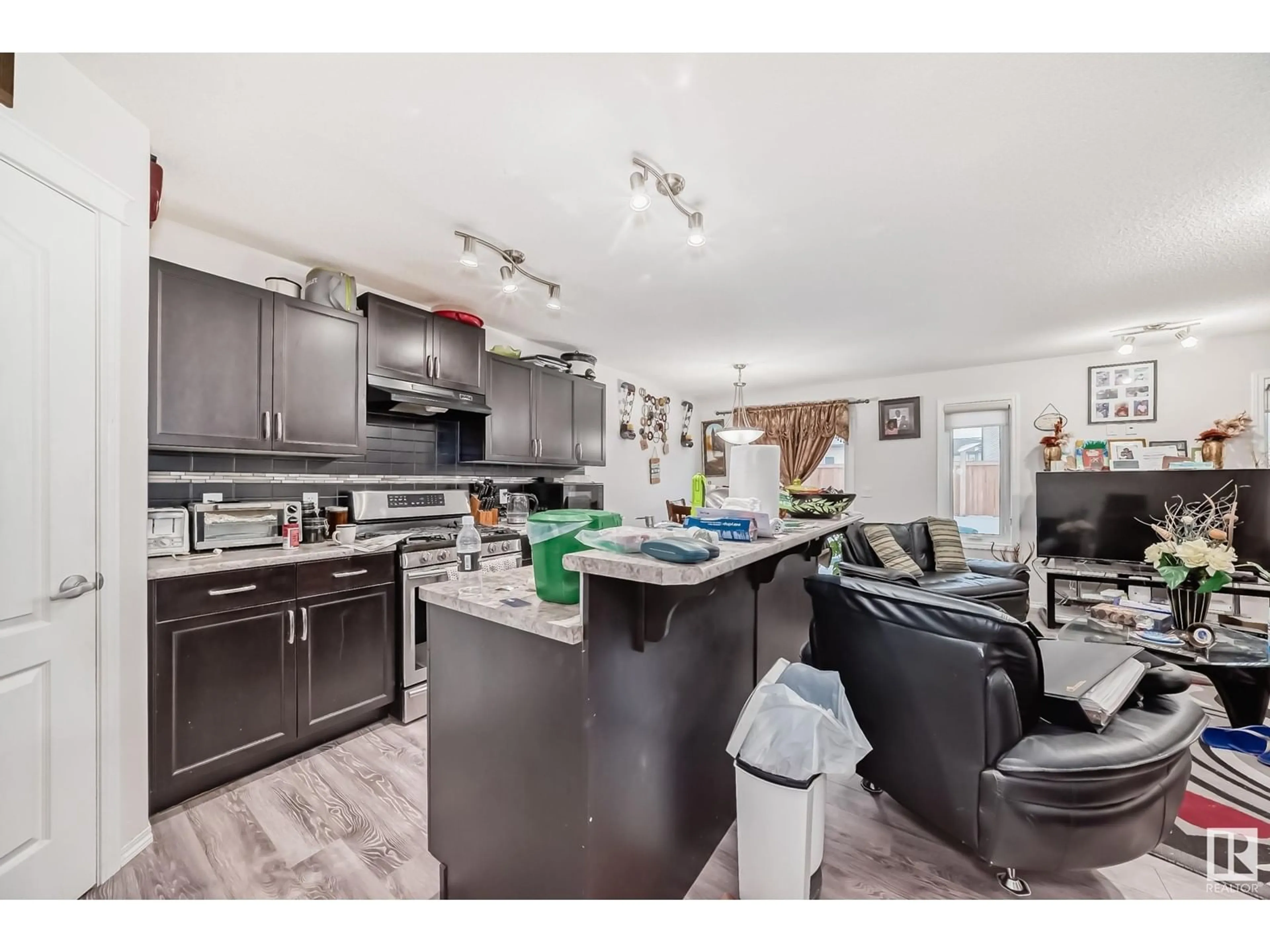 Open concept kitchen, unknown for 3367 14 AVE NW, Edmonton Alberta T6T0X3