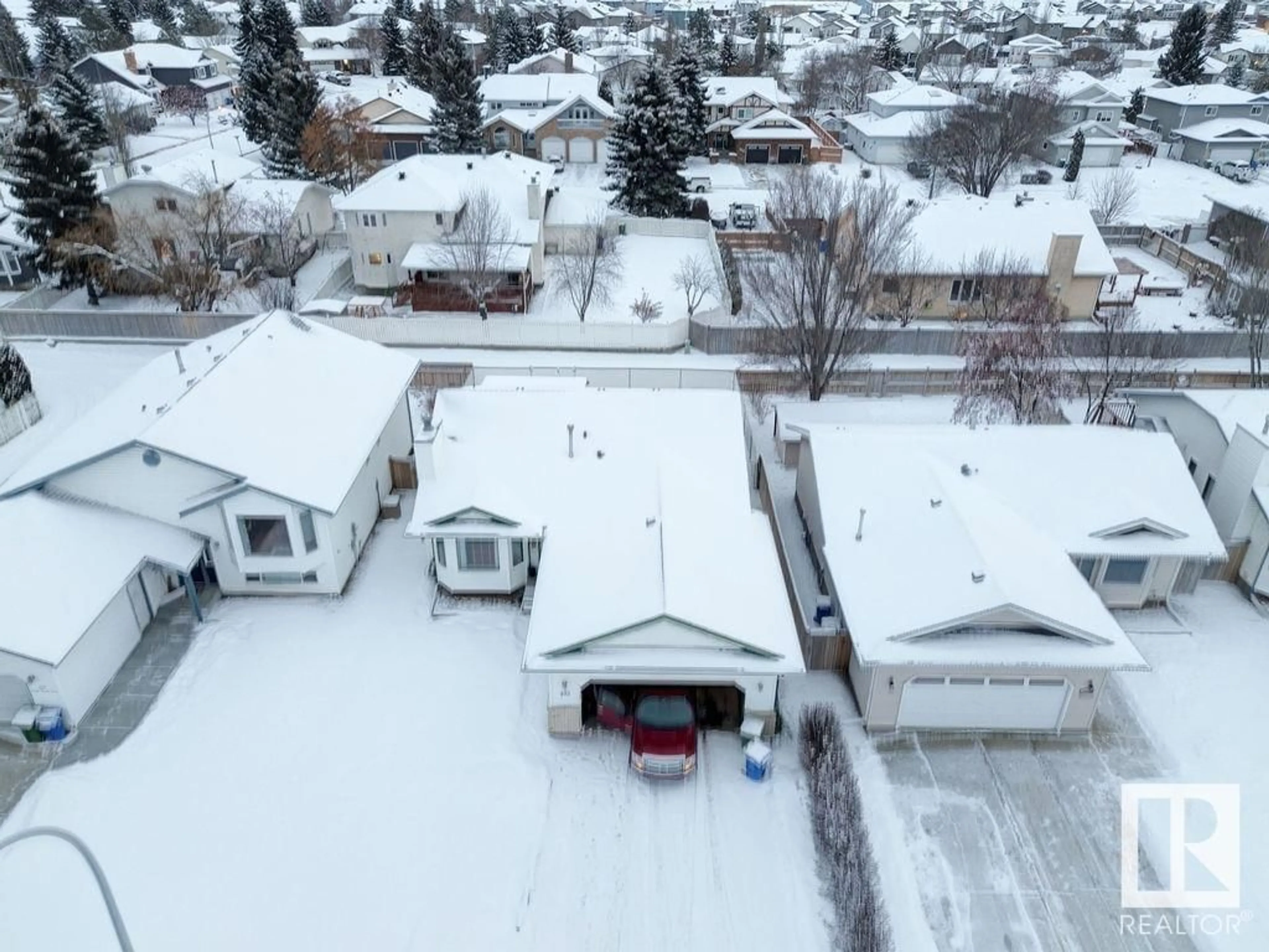 A pic from outside/outdoor area/front of a property/back of a property/a pic from drone, street for 453 Garden Meadows DR, Wetaskiwin Alberta T9A3K3