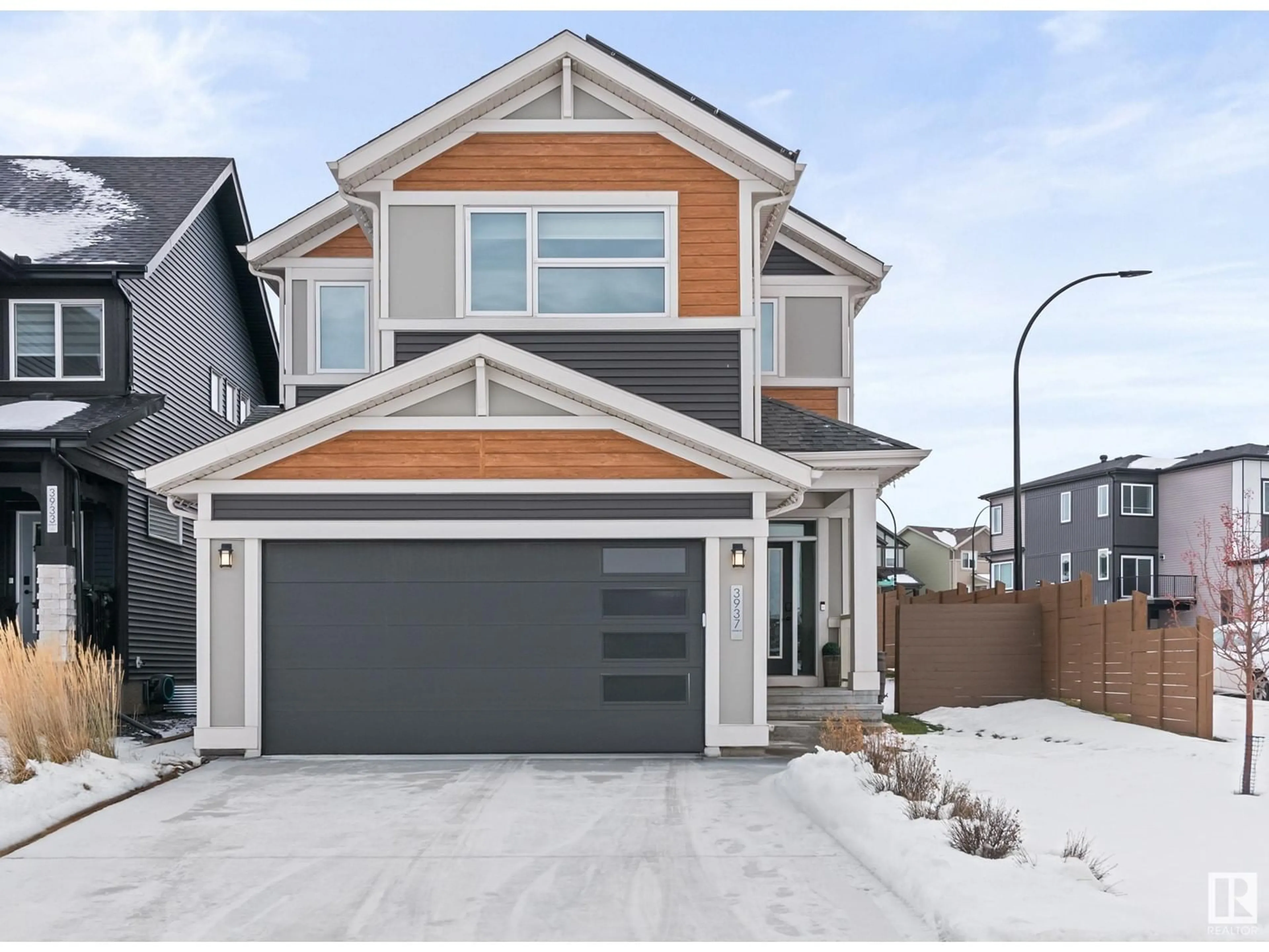 Home with vinyl exterior material, street for 3937 3A AV SW, Edmonton Alberta T6X3A3