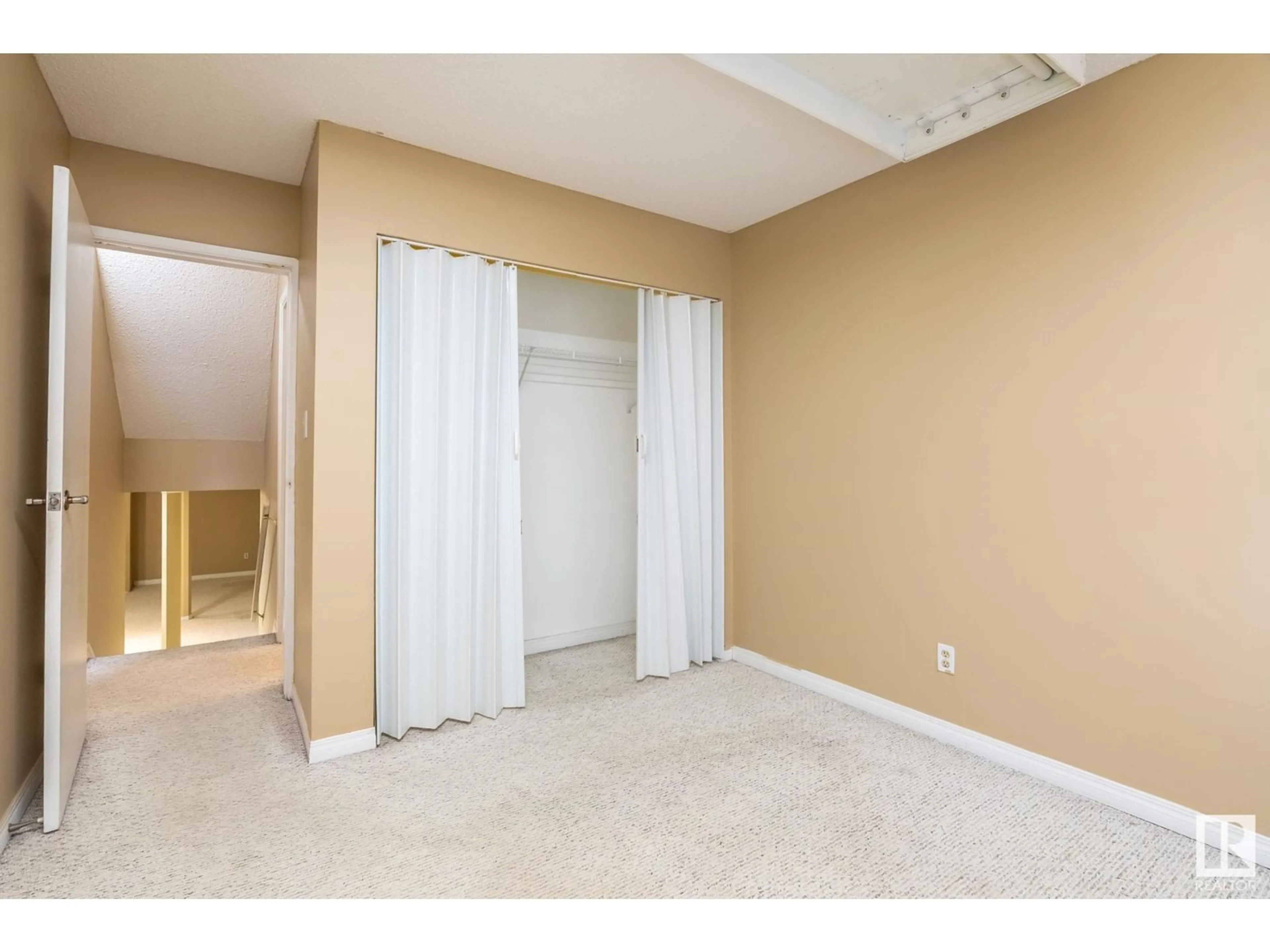 Storage room or clothes room or walk-in closet for 11131 130 ST NW, Edmonton Alberta T5M0Z9