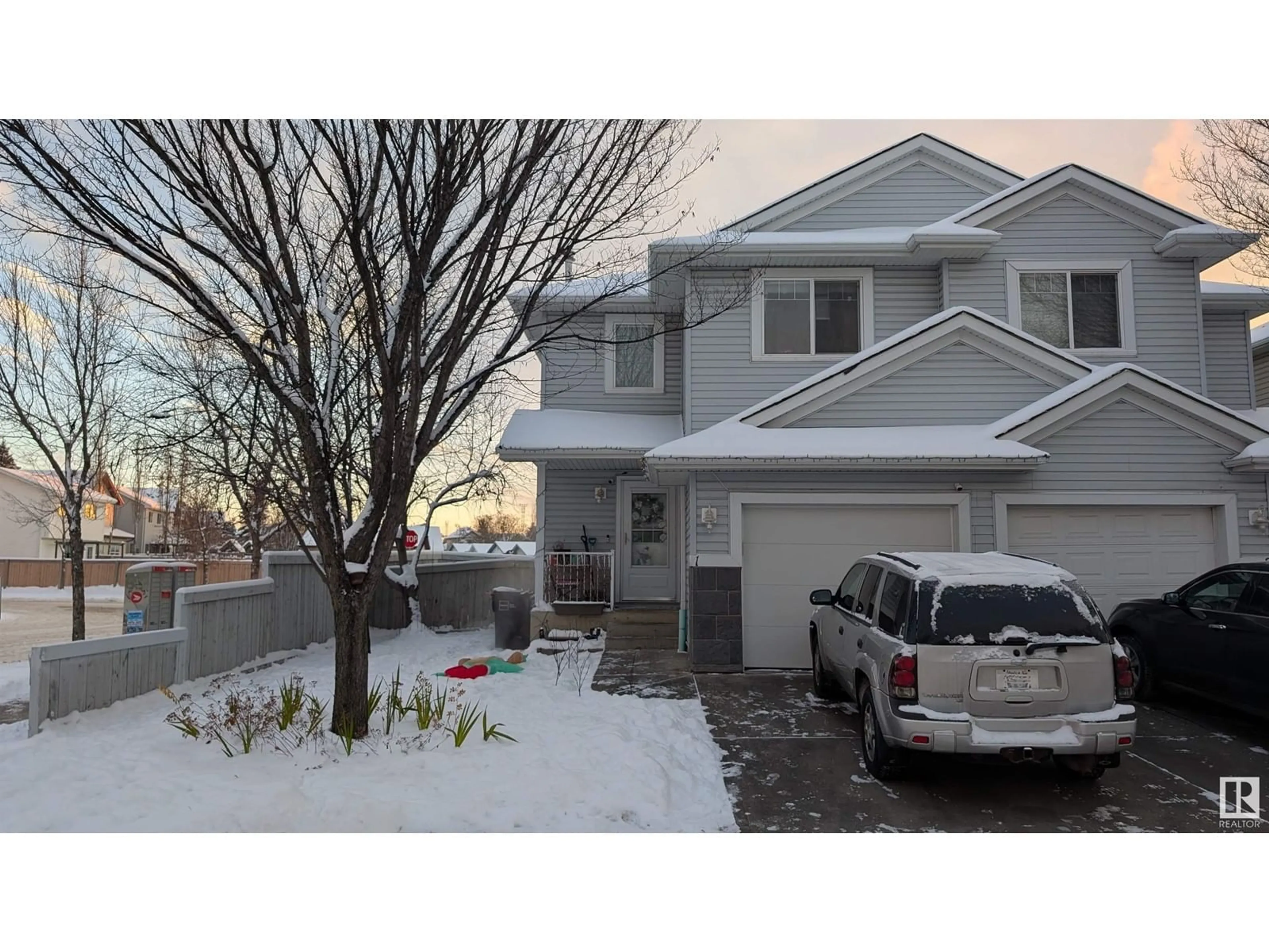 Home with vinyl exterior material, street for #1 4350 23 ST NW NW, Edmonton Alberta T6T1X8