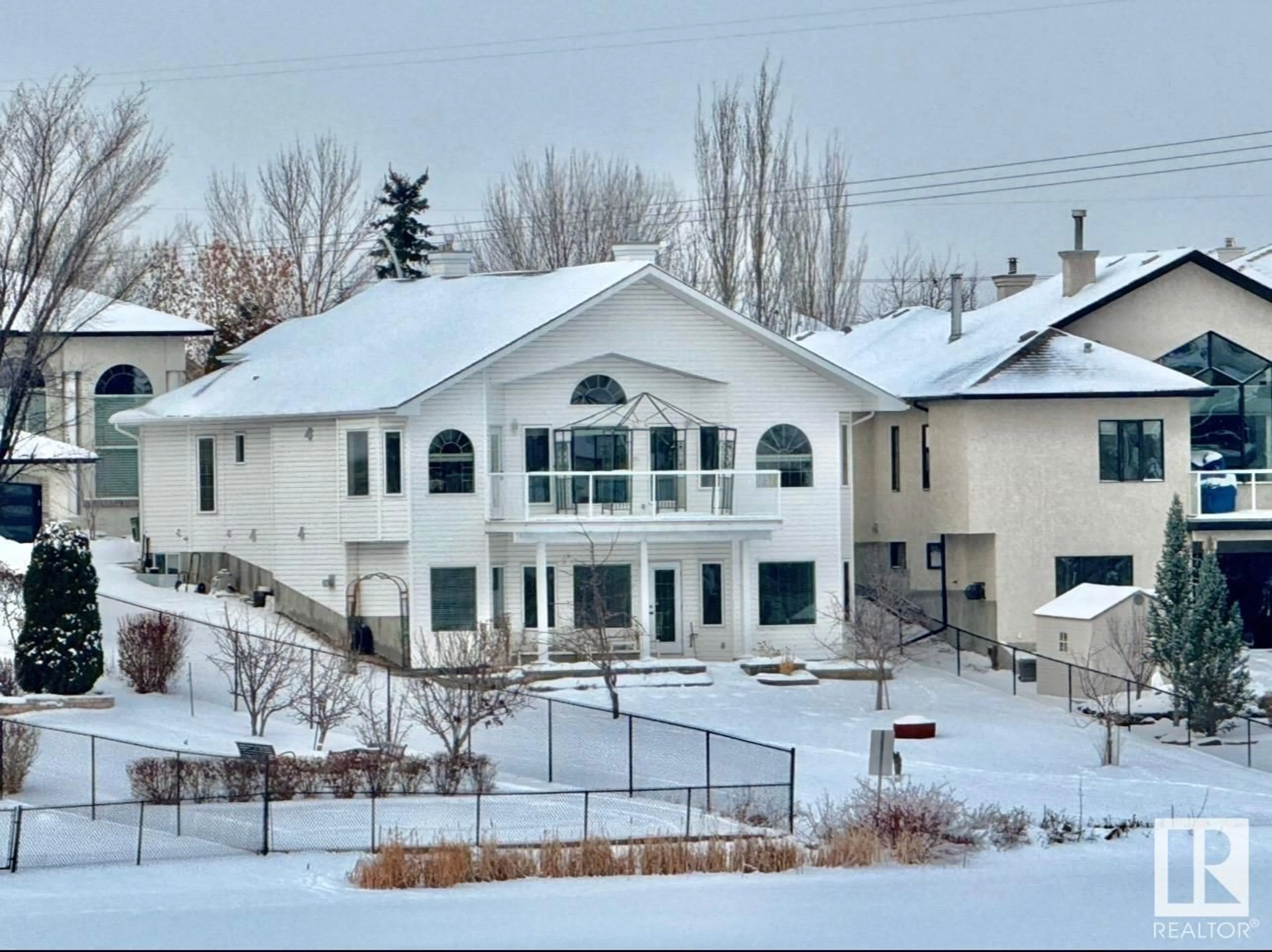 A pic from outside/outdoor area/front of a property/back of a property/a pic from drone, mountain view for 16203 89 ST NW, Edmonton Alberta T5Z3M3