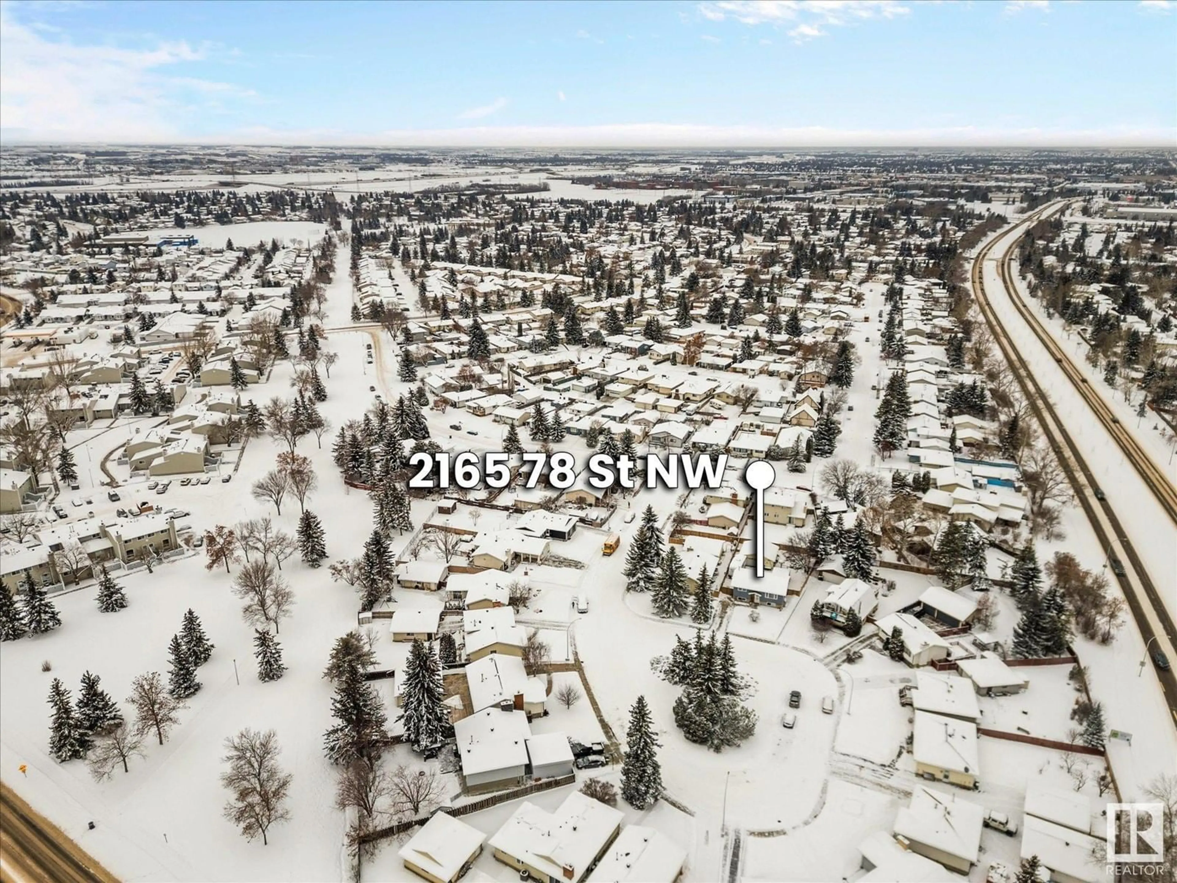 A pic from outside/outdoor area/front of a property/back of a property/a pic from drone, mountain view for 2165 78 ST NW, Edmonton Alberta T6K2E4